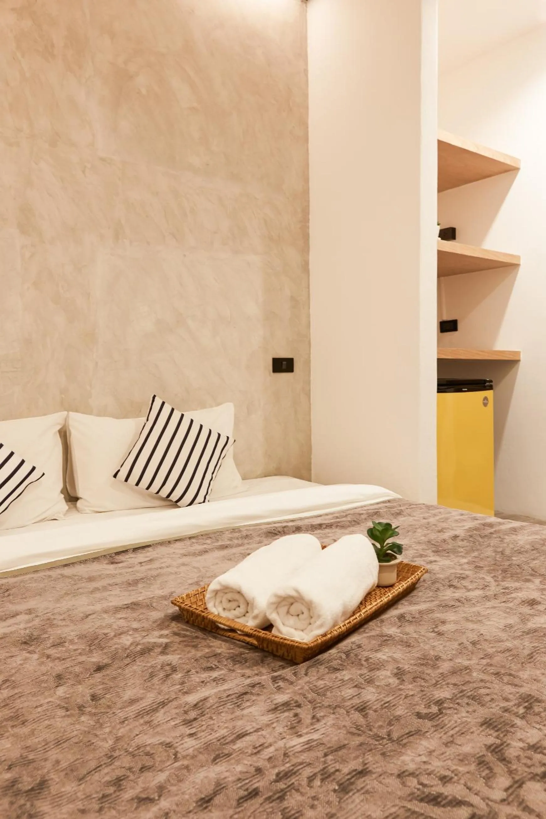 Bed in Vann Bangkok Boutique House