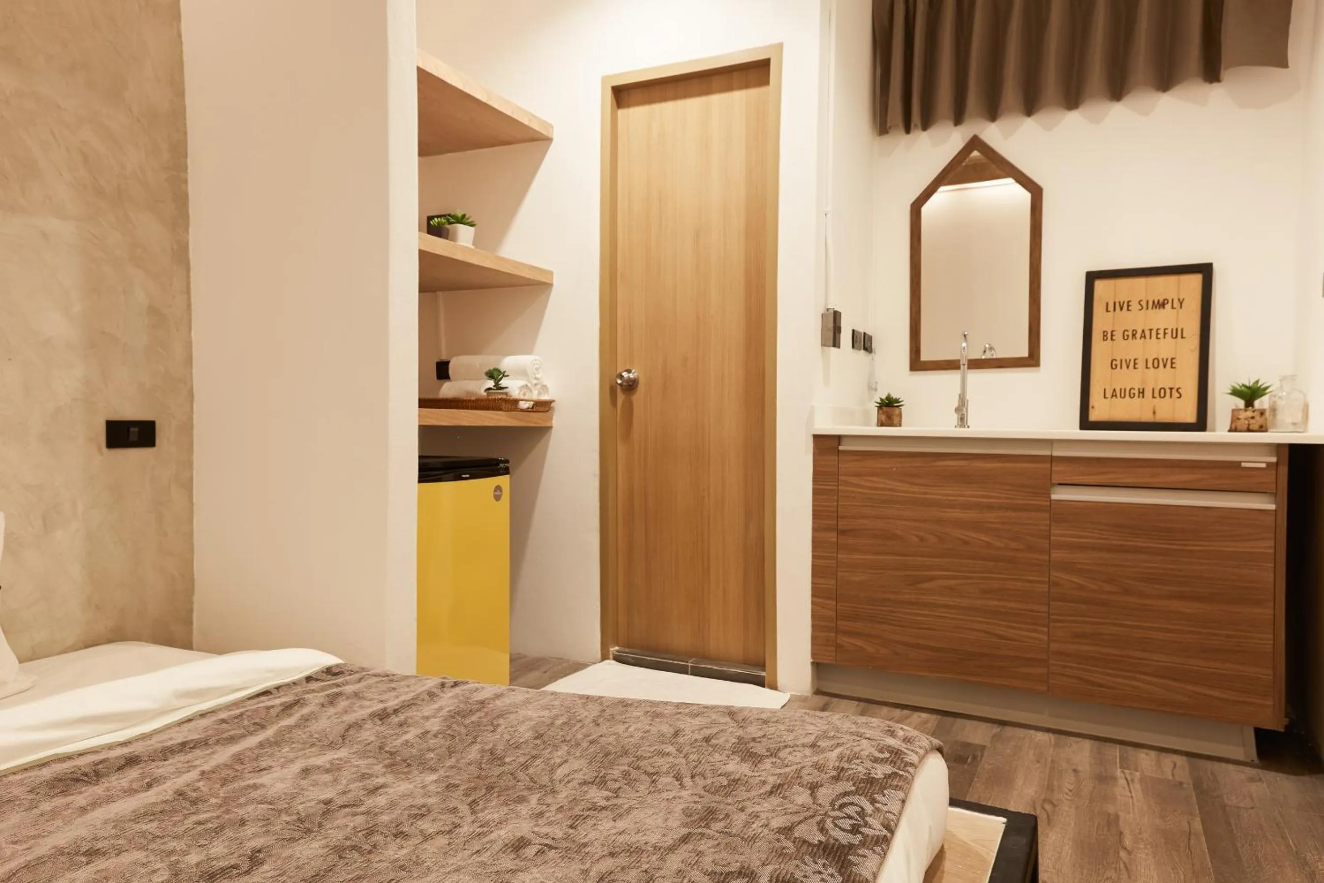 Bed in Vann Bangkok Boutique House