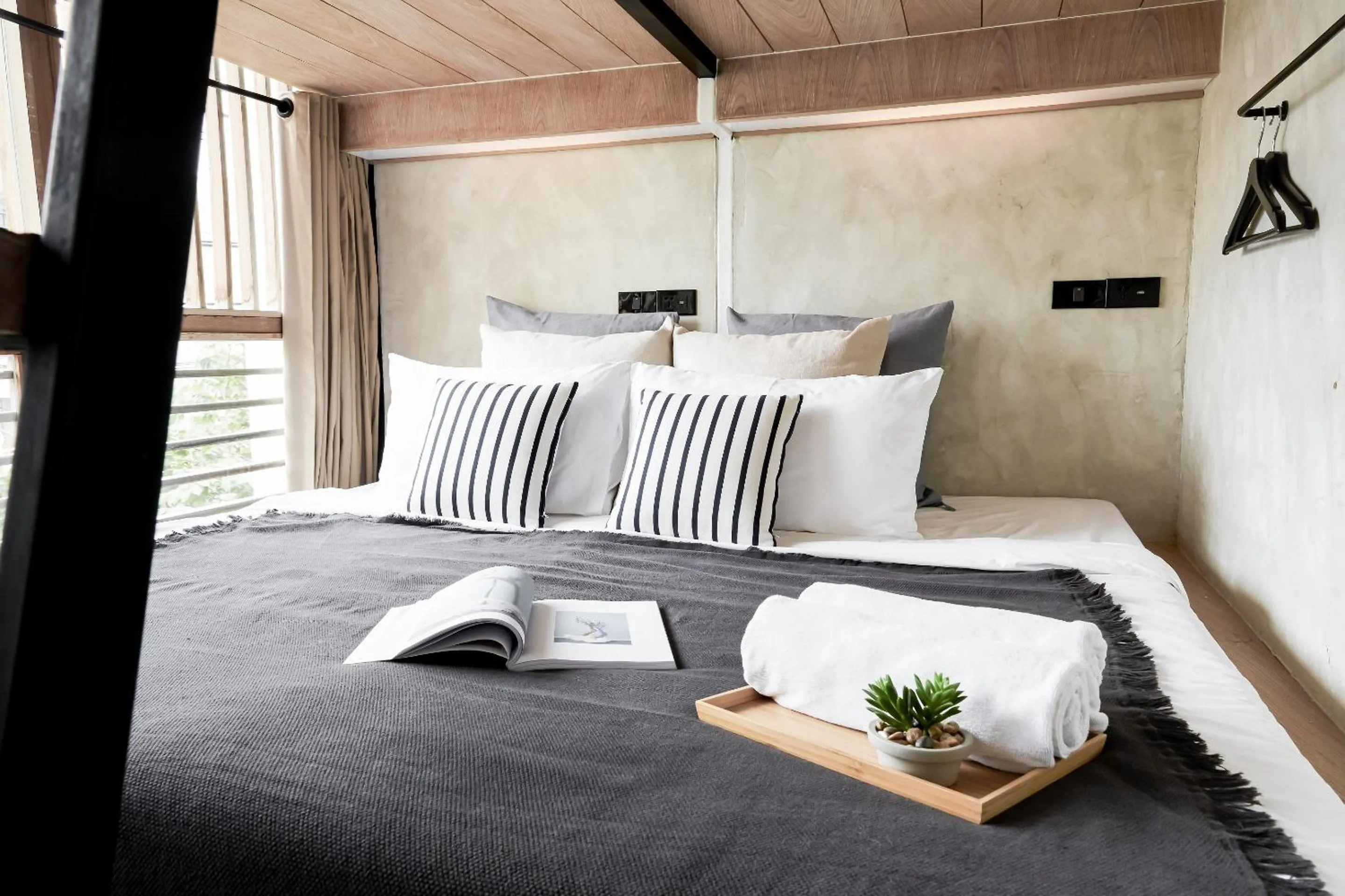 Bed in Vann Bangkok Boutique House