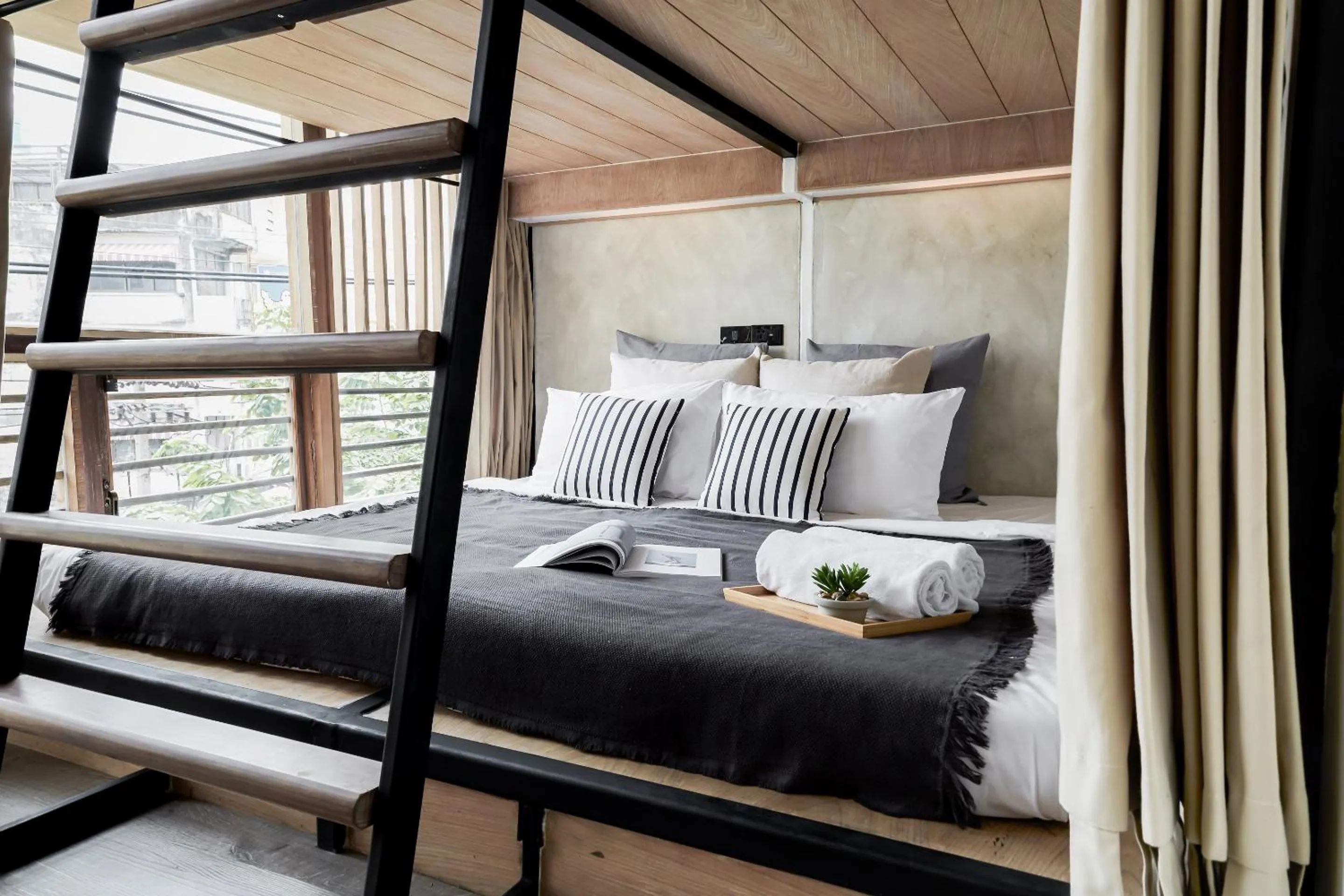 Bed in Vann Bangkok Boutique House