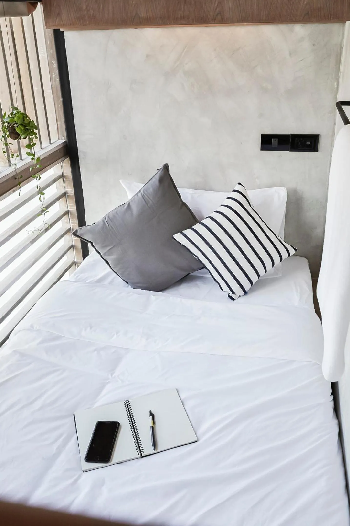 Bed in Vann Bangkok Boutique House