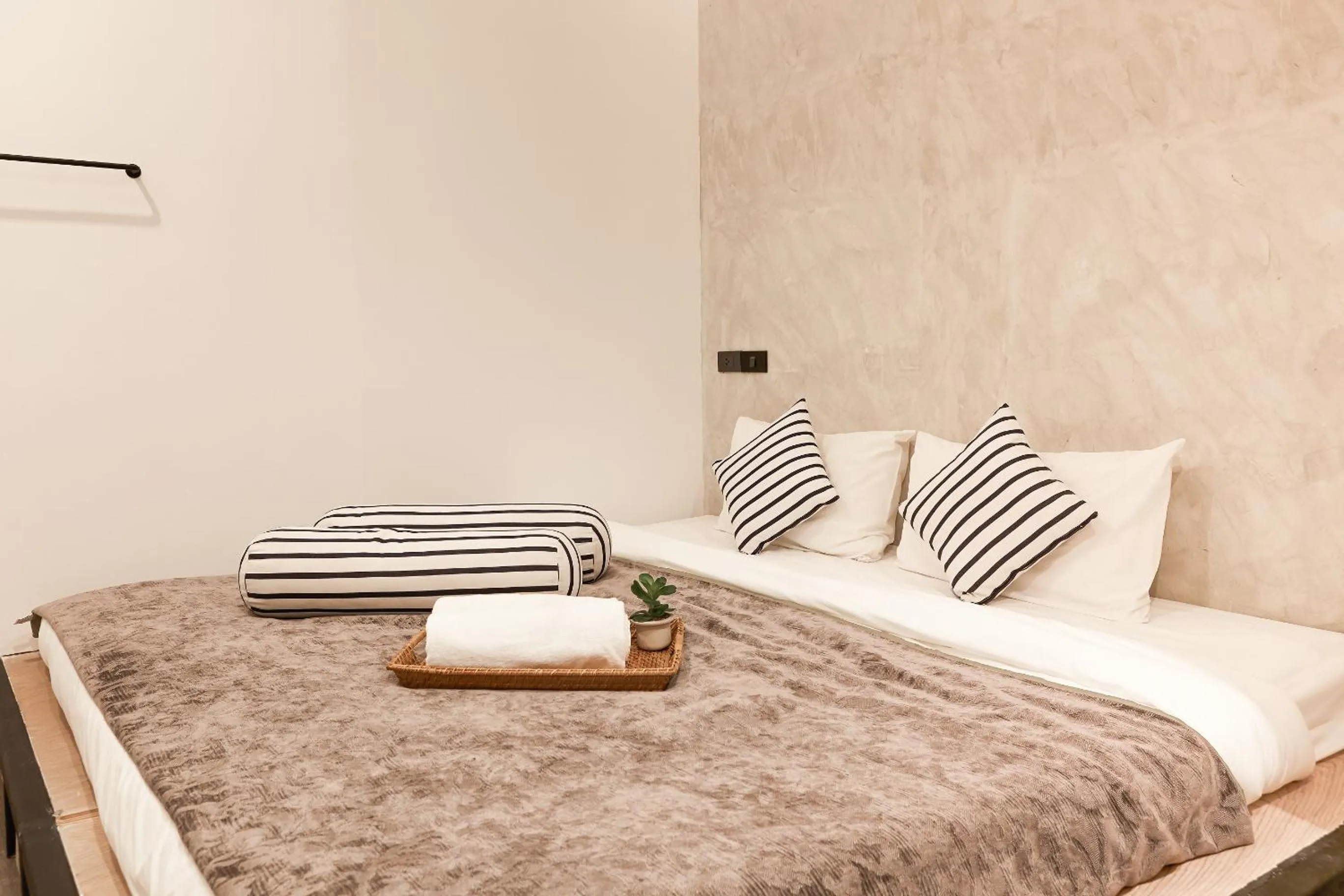 Bed in Vann Bangkok Boutique House