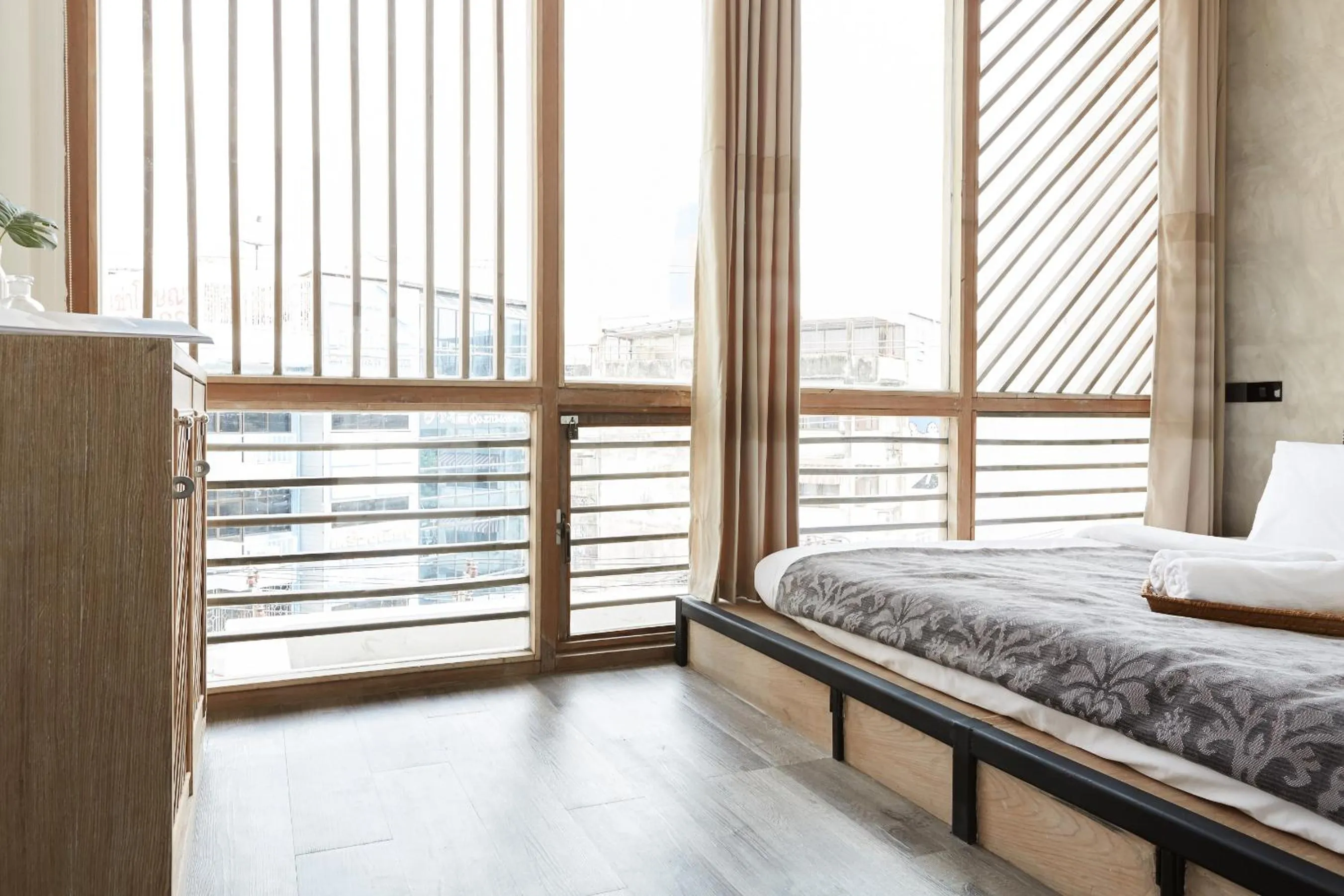 Bed in Vann Bangkok Boutique House