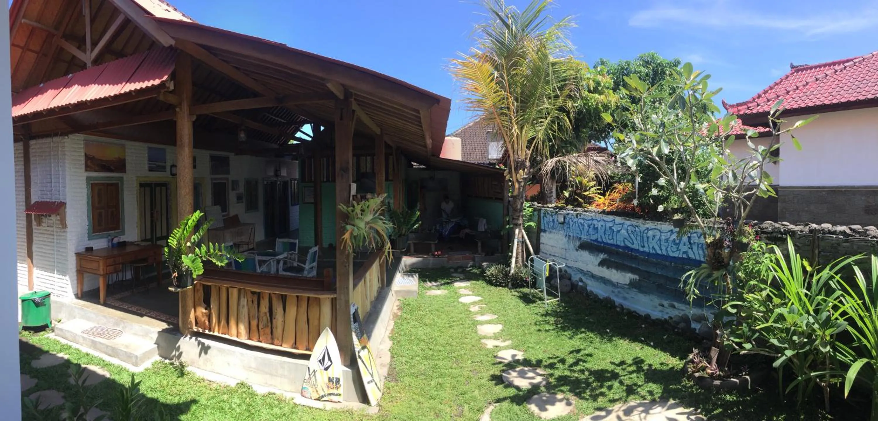 Communal lounge/ TV room in Medewi Secret SurfCamp
