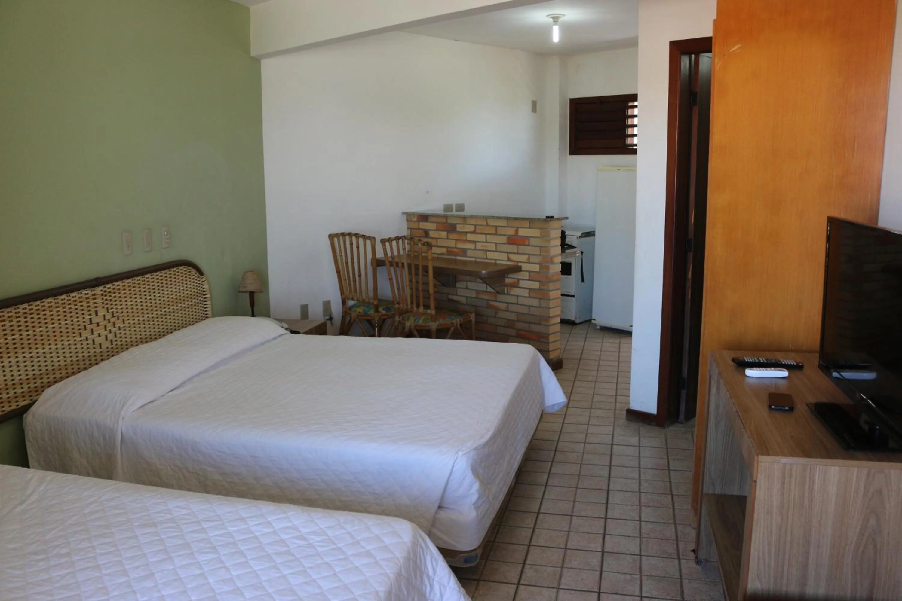 Photo of the whole room, Bed in Marambaia Apart Hotel