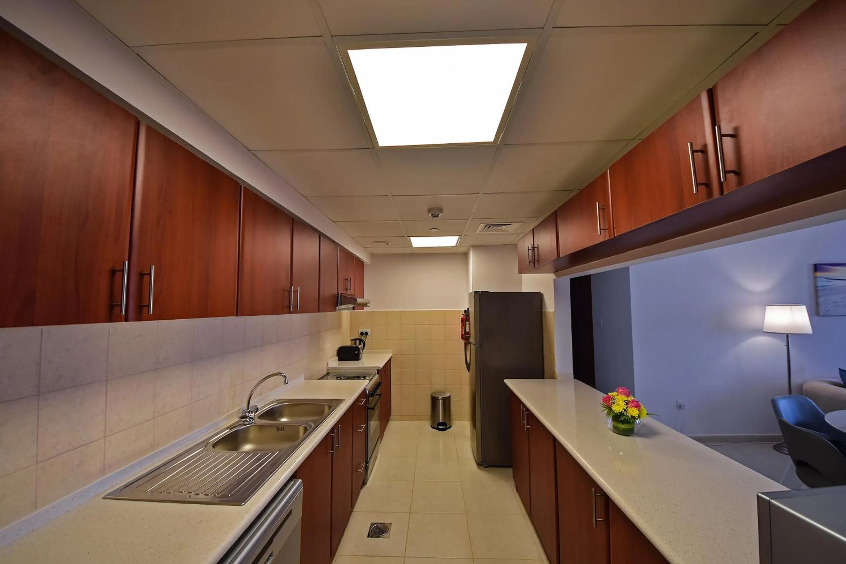 Kitchen or kitchenette in Jannah Hotel Apartments & Villas