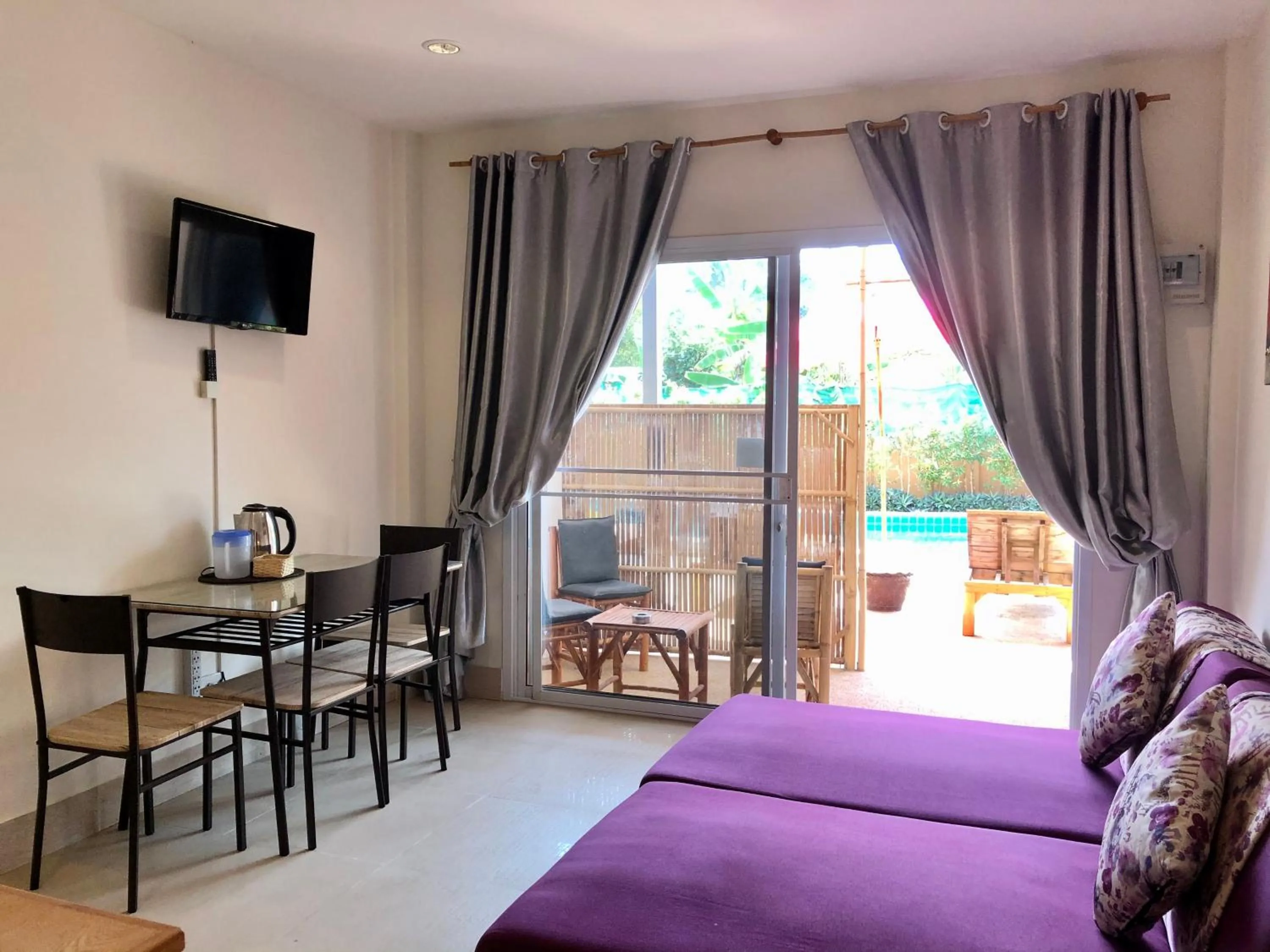 Communal lounge/ TV room, Bed in Samui Zenity