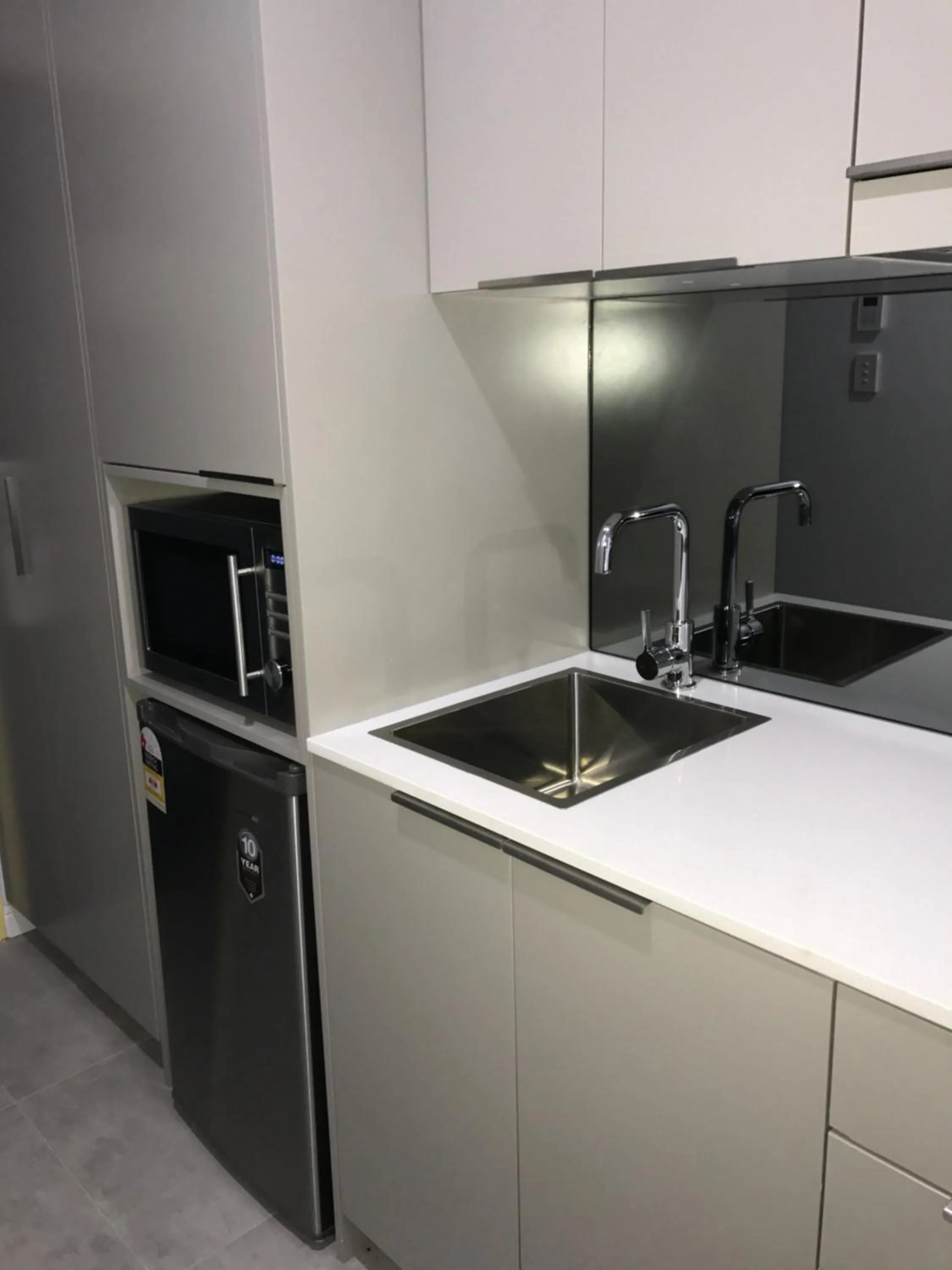 Kitchen or kitchenette in Value Suites Green Square