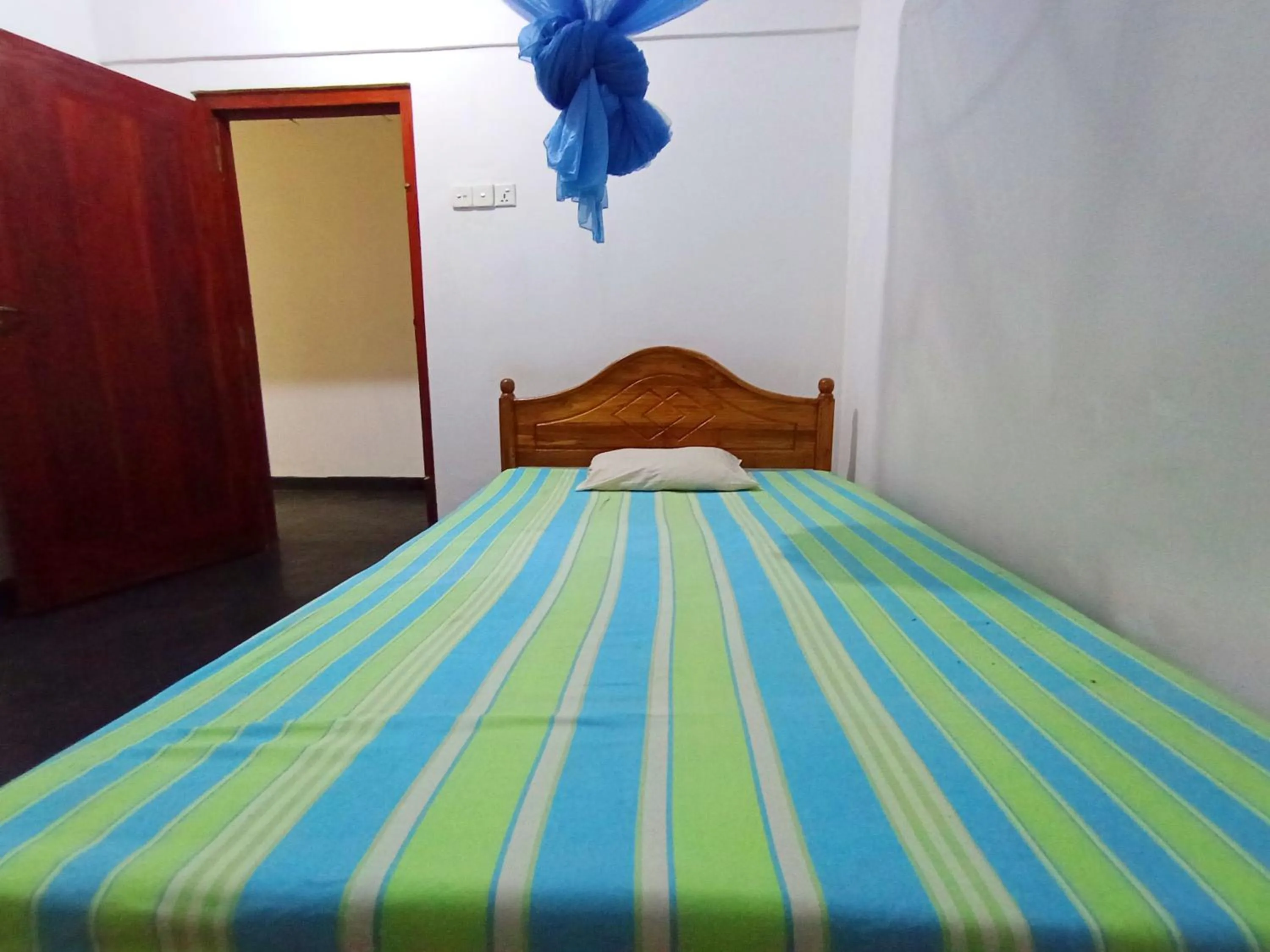 Bed in Villa Agrico and Surf Guest