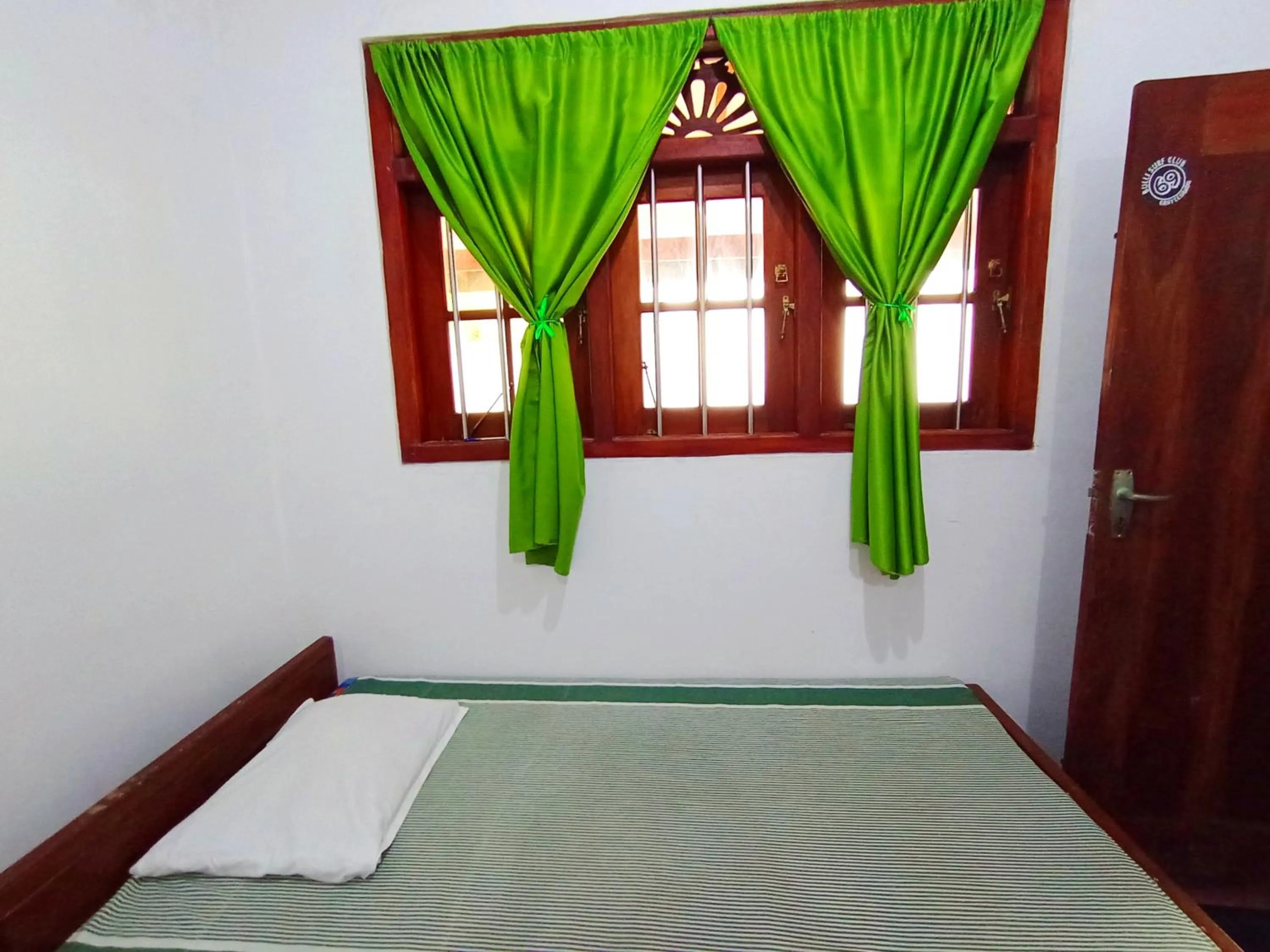 Bed in Villa Agrico and Surf Guest