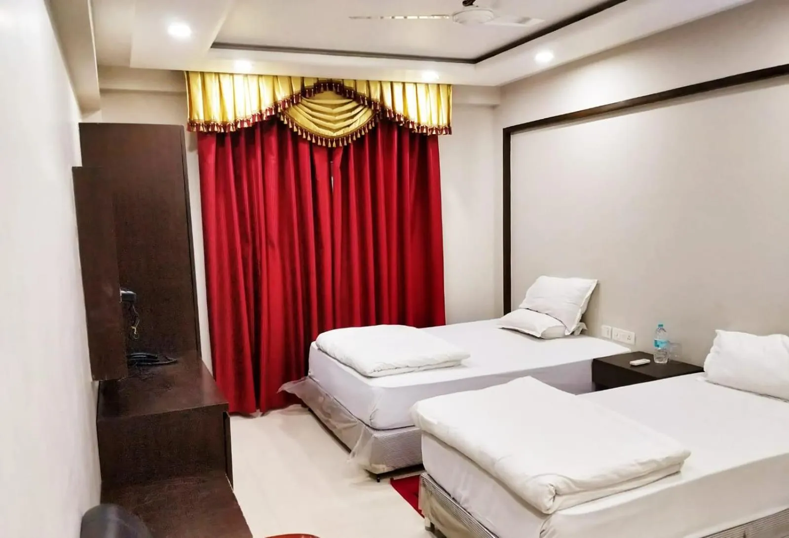 Photo of the whole room, Bed in Bodhgaya Seven Inn Hotel n Restaurant