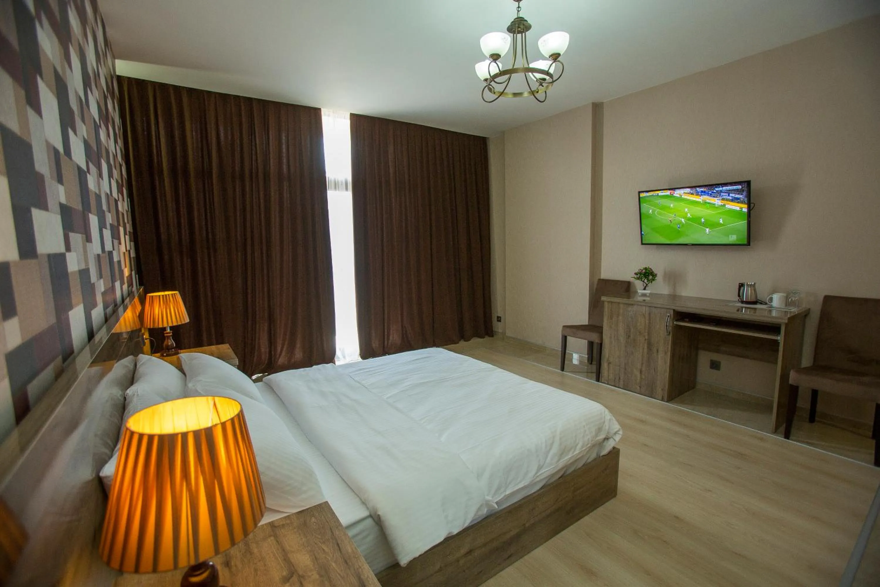 Photo of the whole room, Bed in Ire Palace