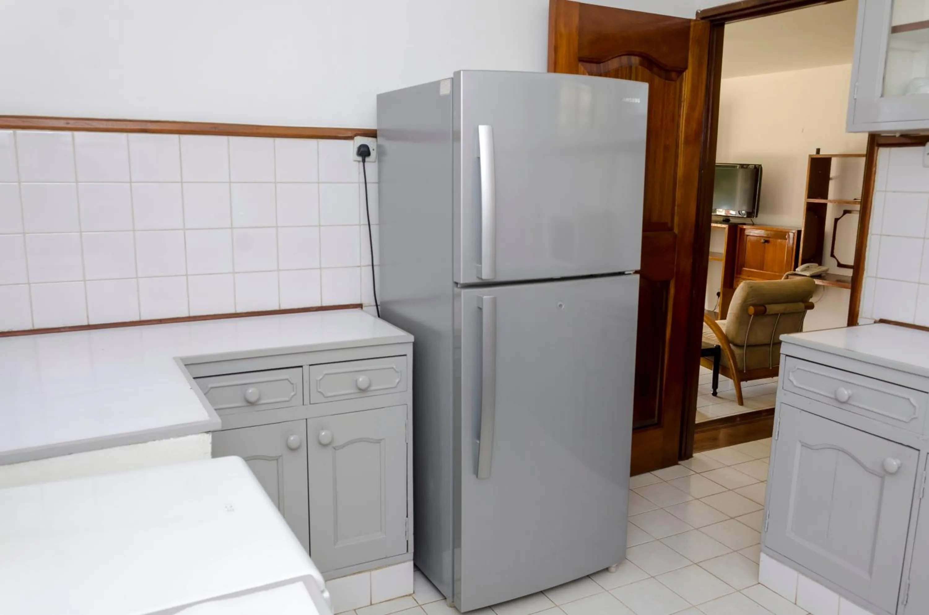 Kitchen or kitchenette in Golf Course Apartments