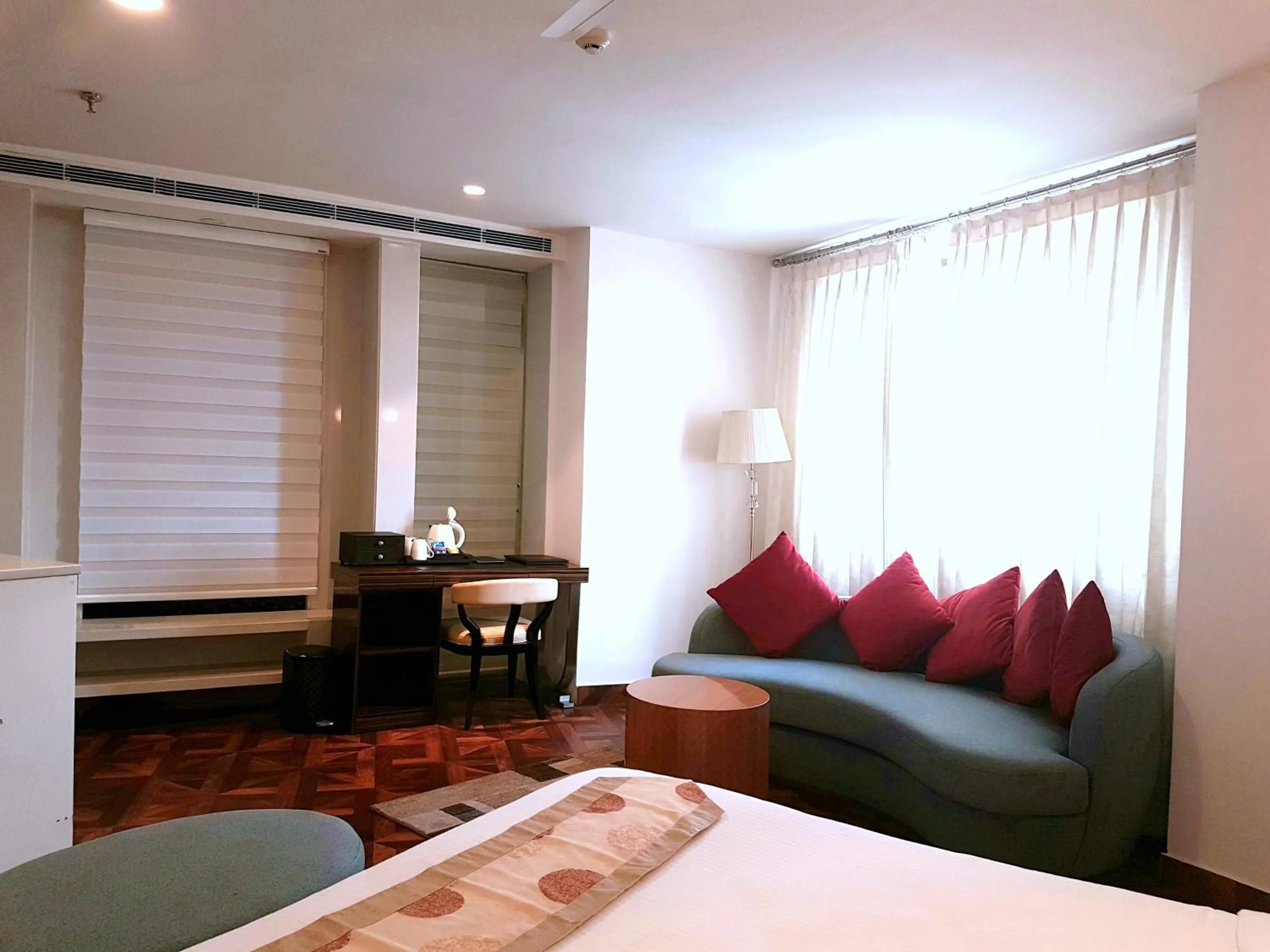 Seating area, Bed in Pal Heights Mantra