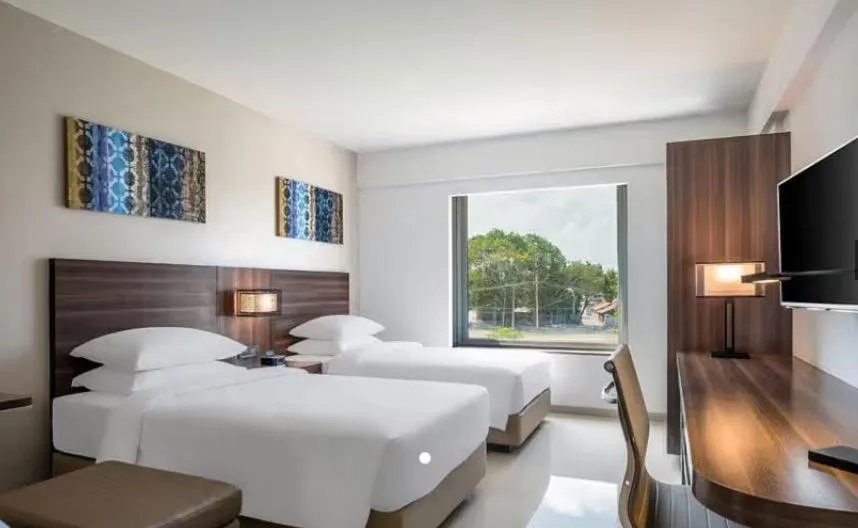 Bed in The Residency Towers, Rameswaram