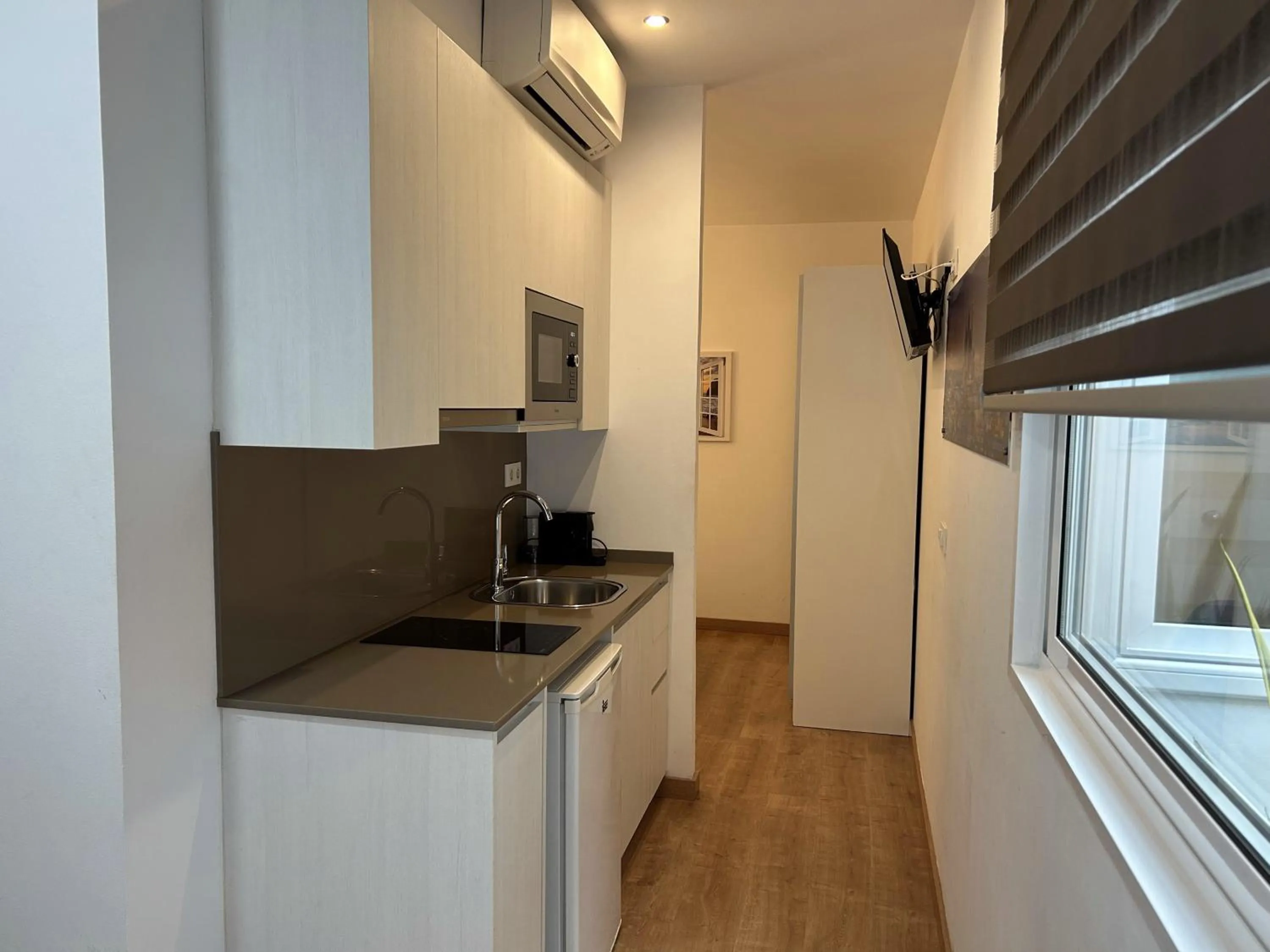 Kitchen or kitchenette in Apartahotel Baldiri