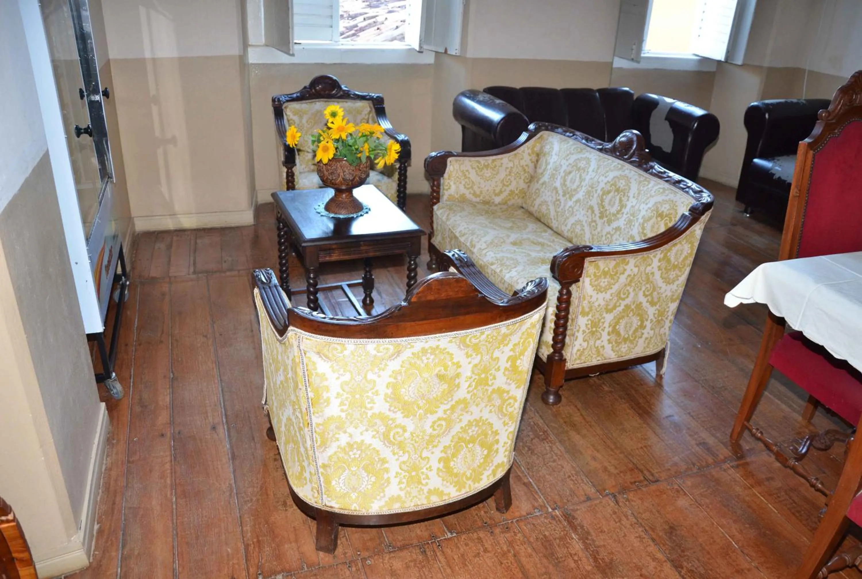 Communal lounge/ TV room in Hotel e Pousada O Casarão