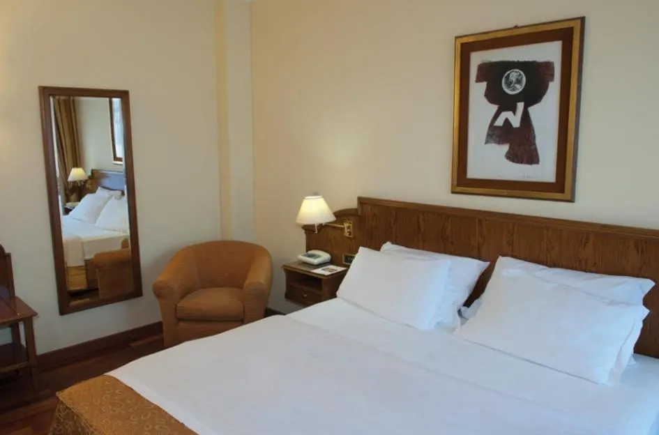 Bed in LVG Hotel Collection - La Bussola