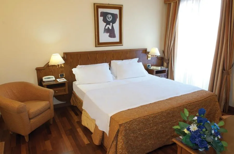 Bed in LVG Hotel Collection - La Bussola