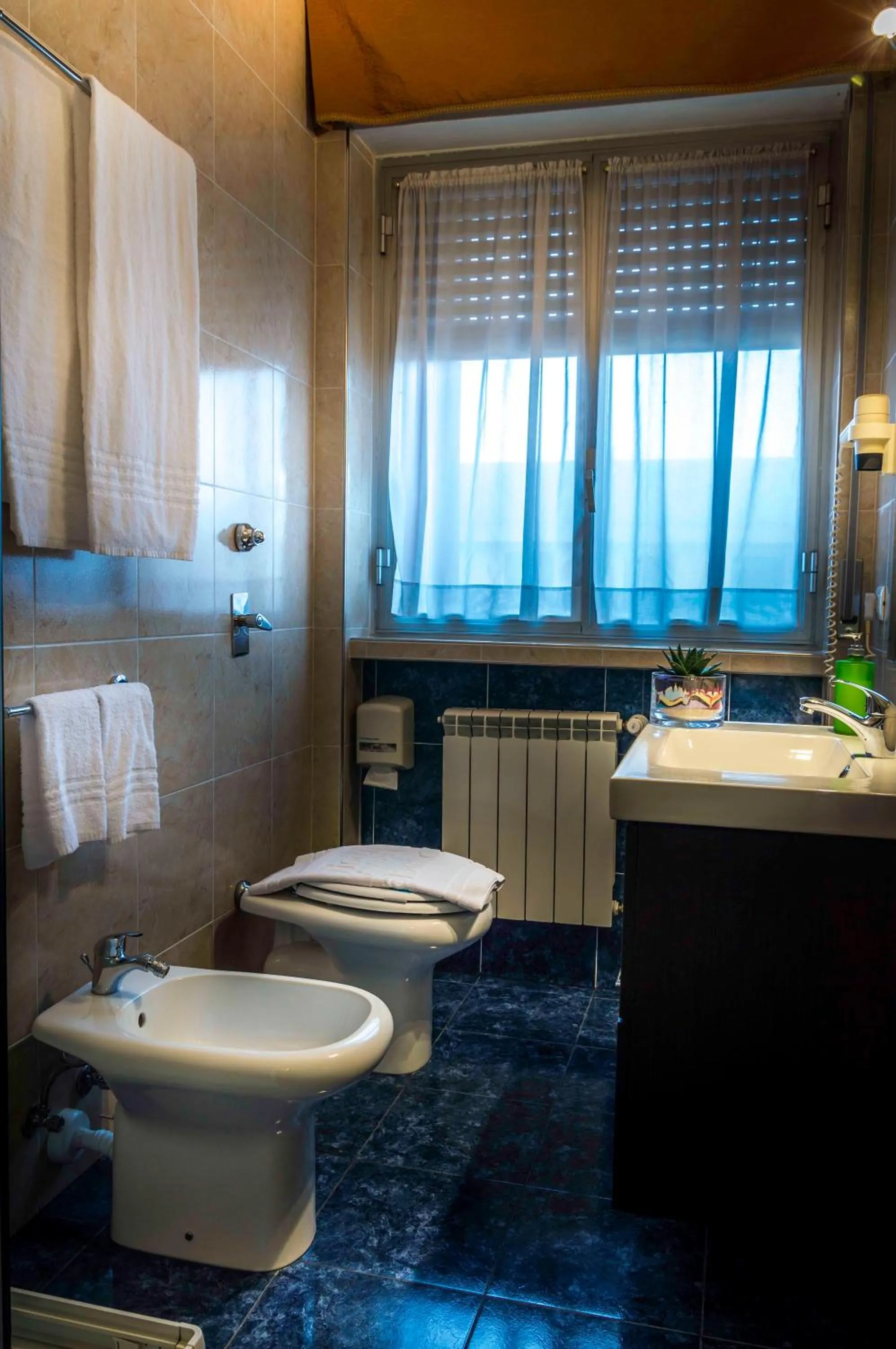 Toilet in LVG Hotel Collection - La Bussola