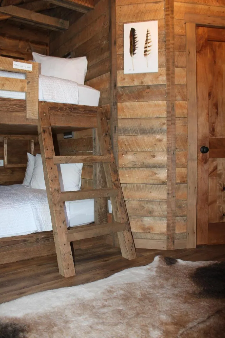 Bed in Elkhorn Cabins and Inn