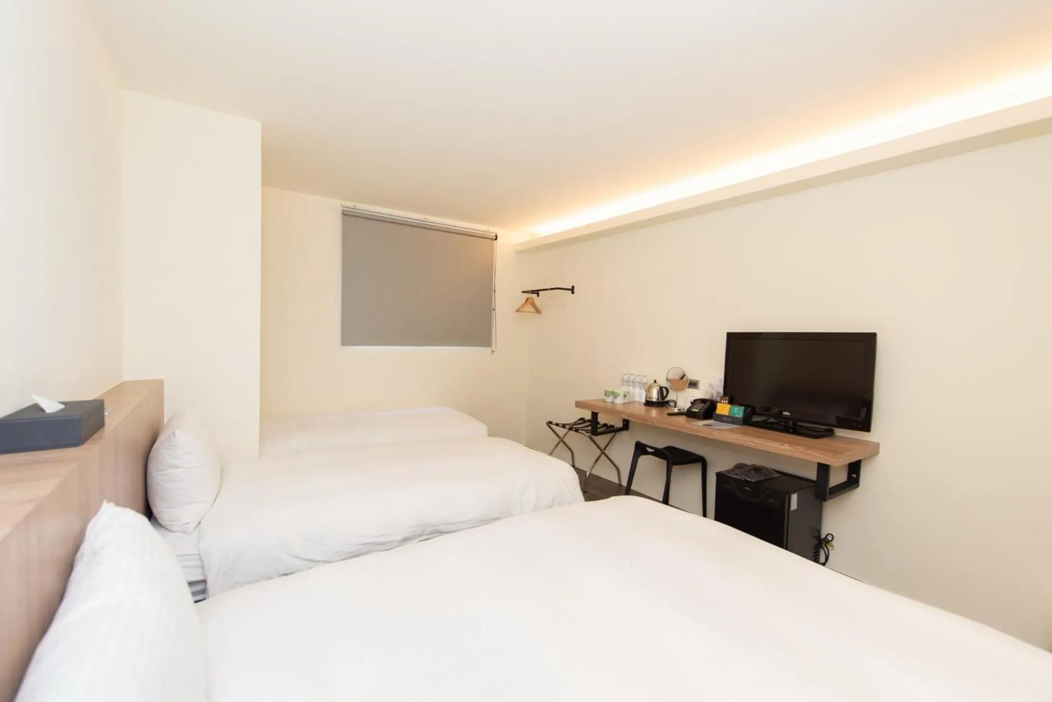 Bed in Traveller Inn Tiehua Cultural and Creative Hotel II