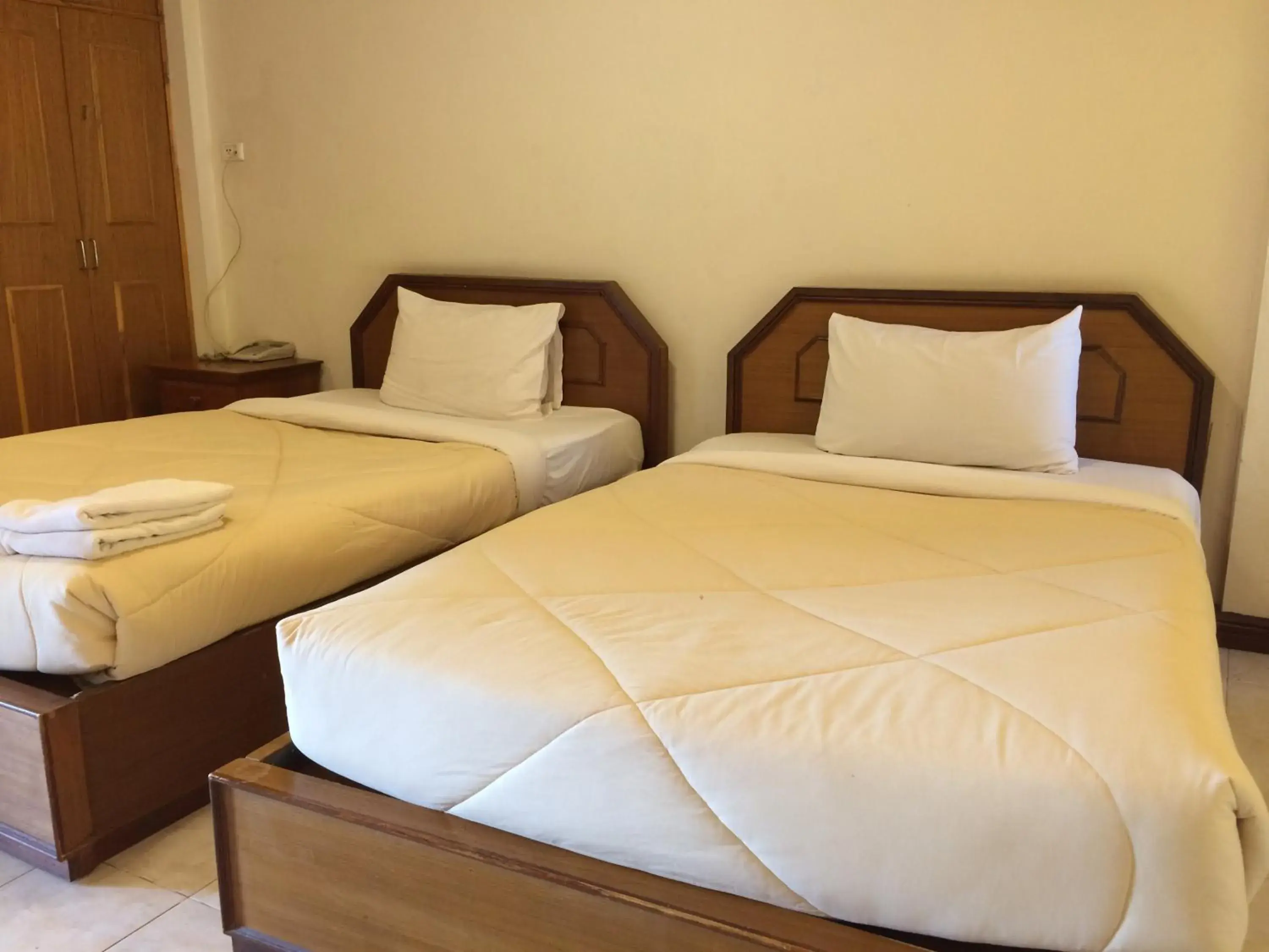 Economy Quadruple Room in Kraisaeng Place Economy Quadruple Room in Kraisaeng Place