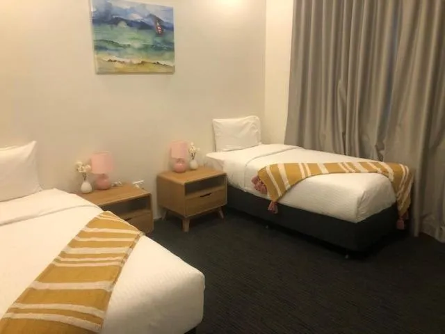 Bed in Gunyah Hotel