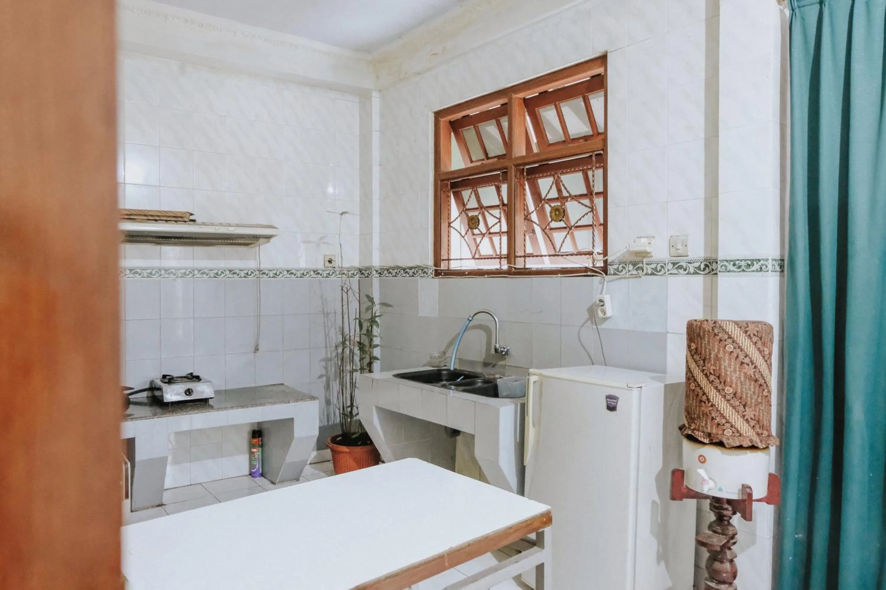 Kitchen or kitchenette in Glory Homestay