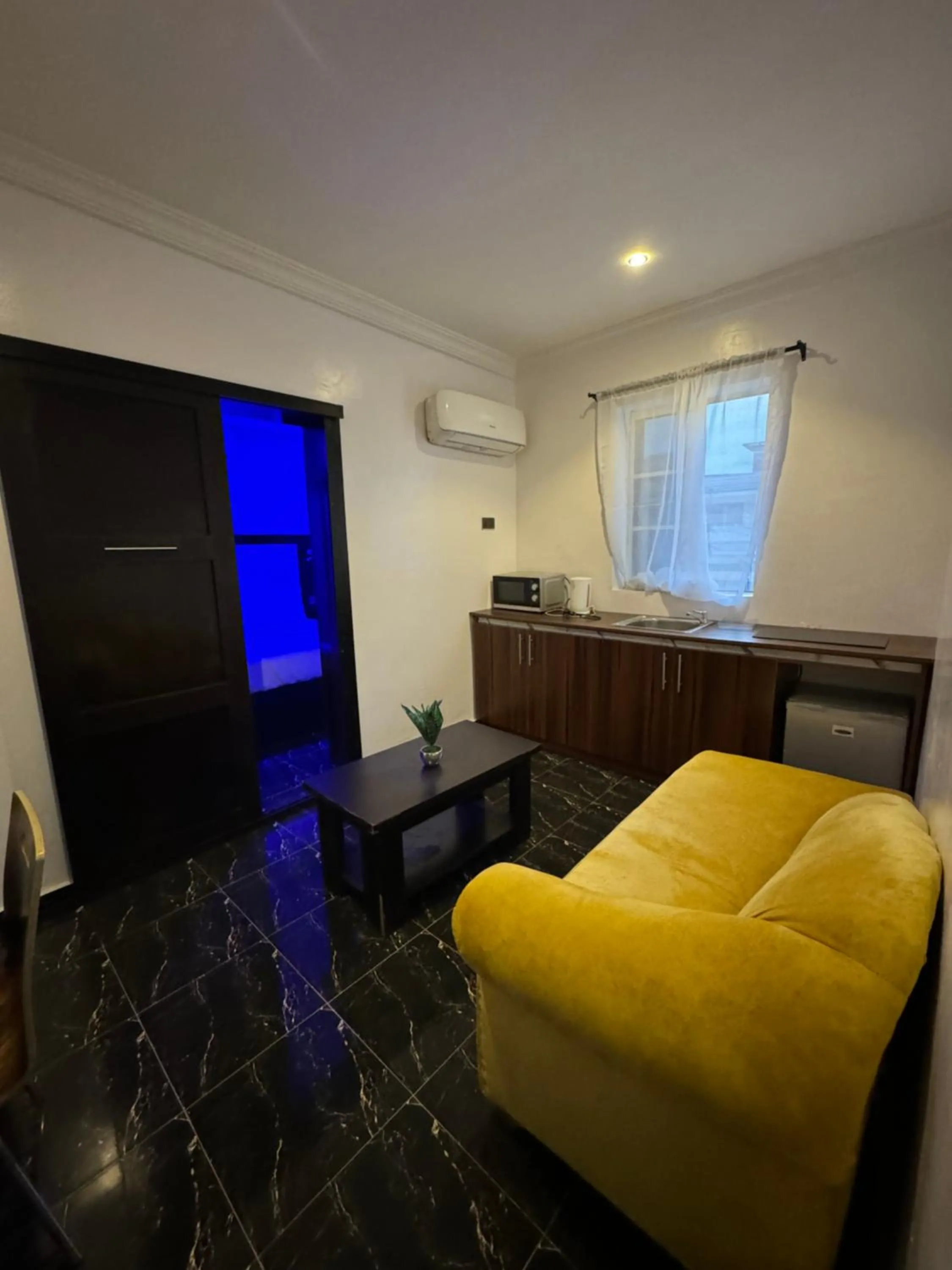 Living room in Posh Hotel and Suites Ikeja