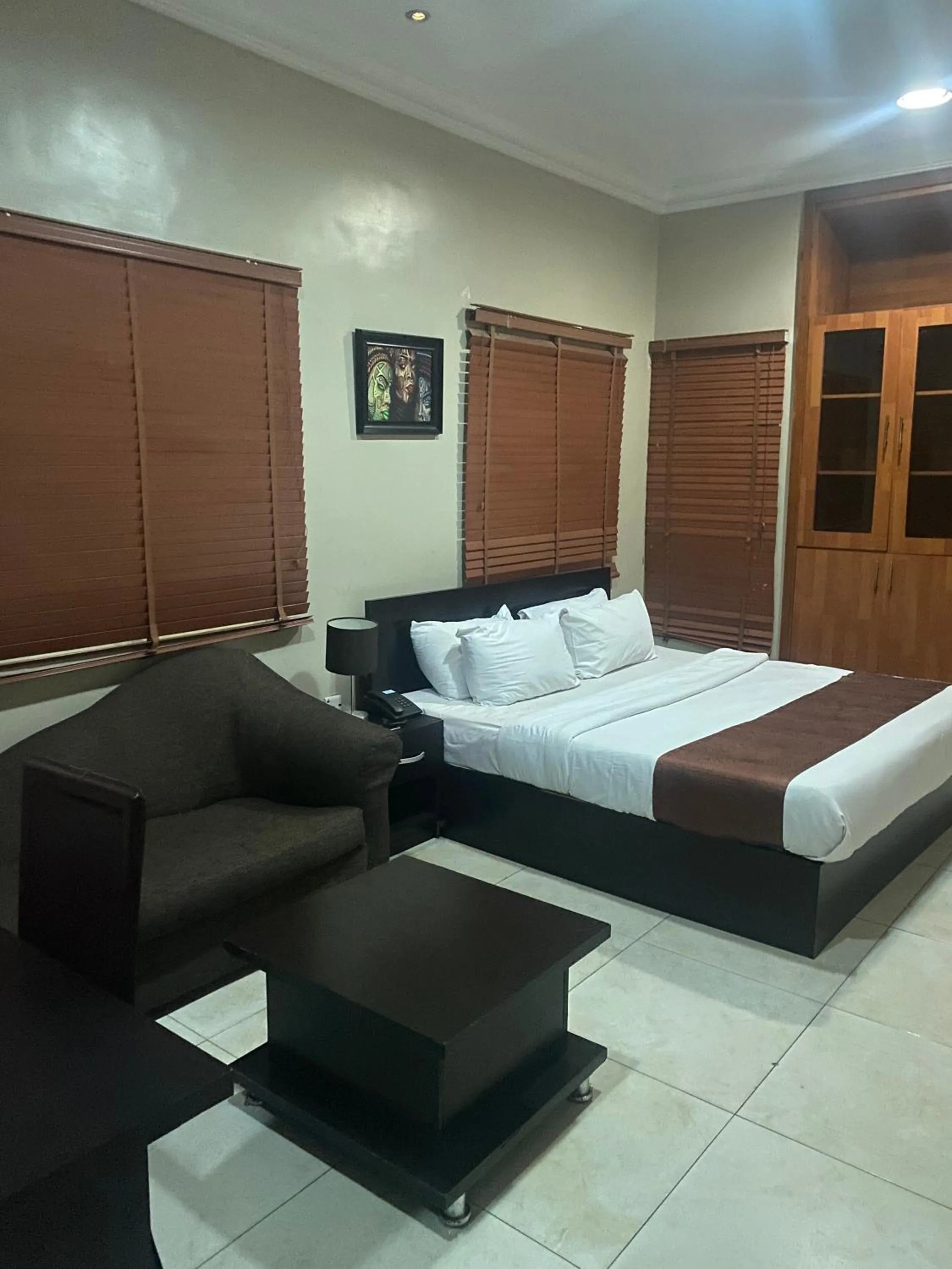 Photo of the whole room, Bed in Posh Hotel and Suites Ikeja