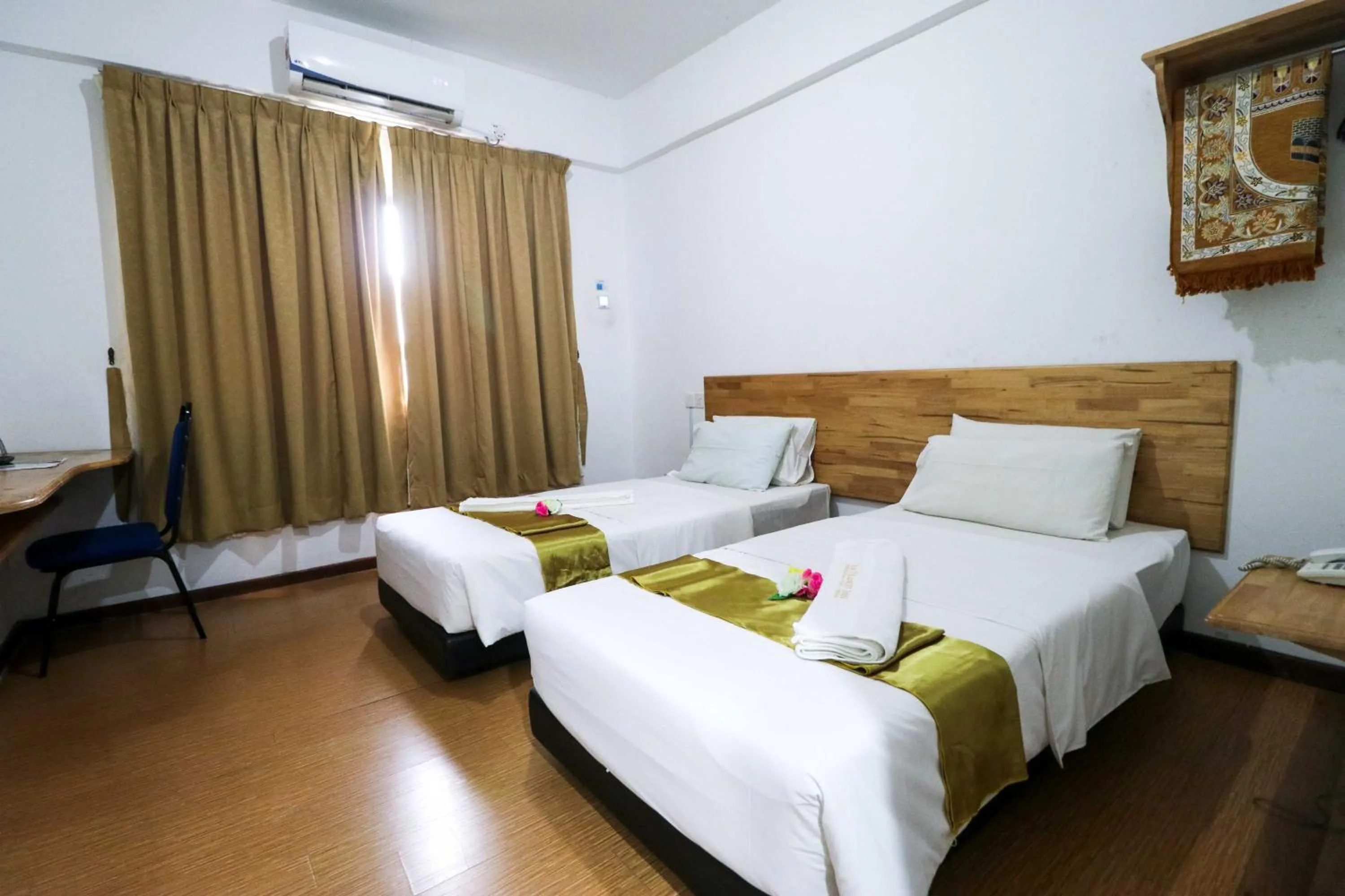 Bed in AM Transit Inn Kuala Terengganu