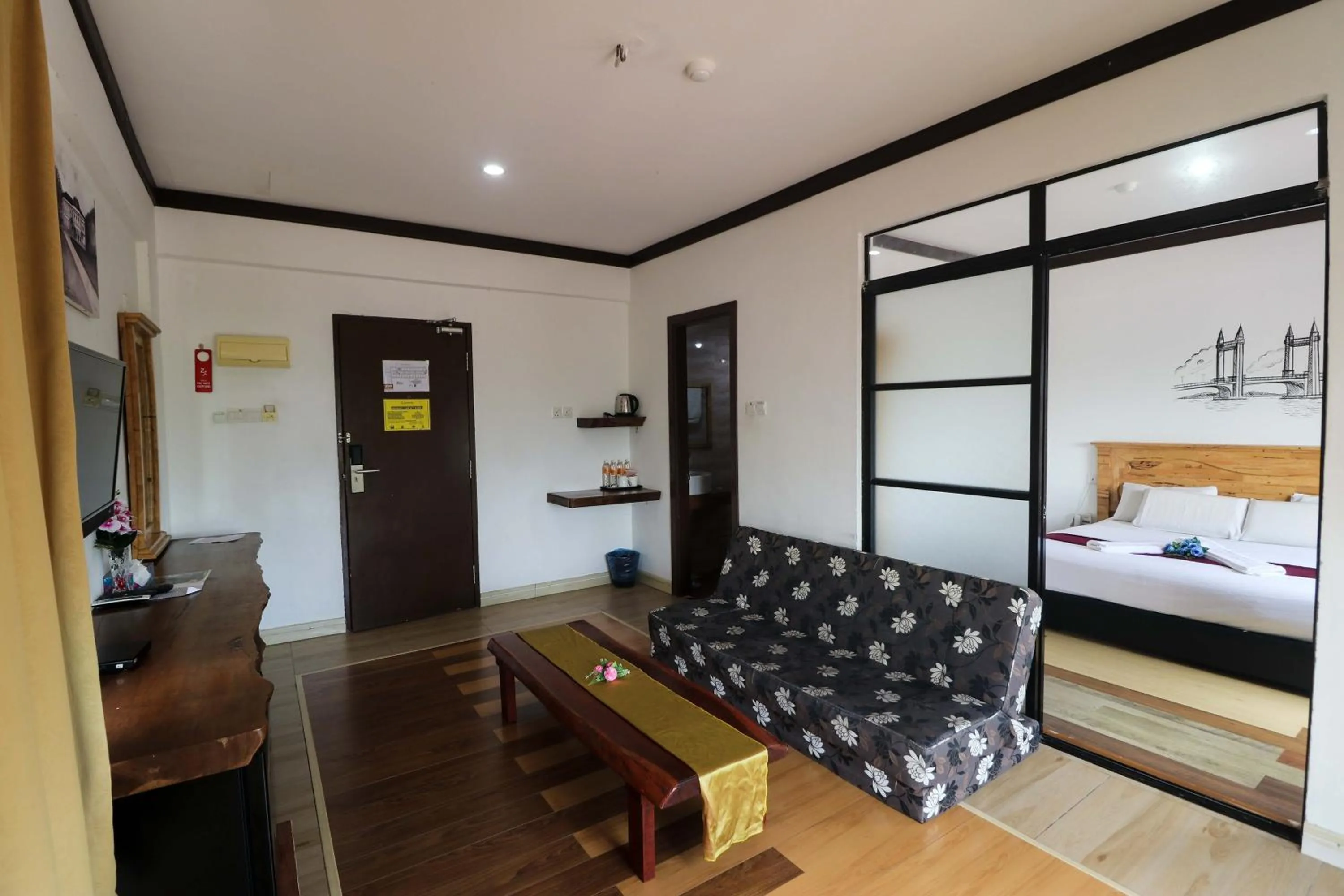 Living room, Bed in AM Transit Inn Kuala Terengganu