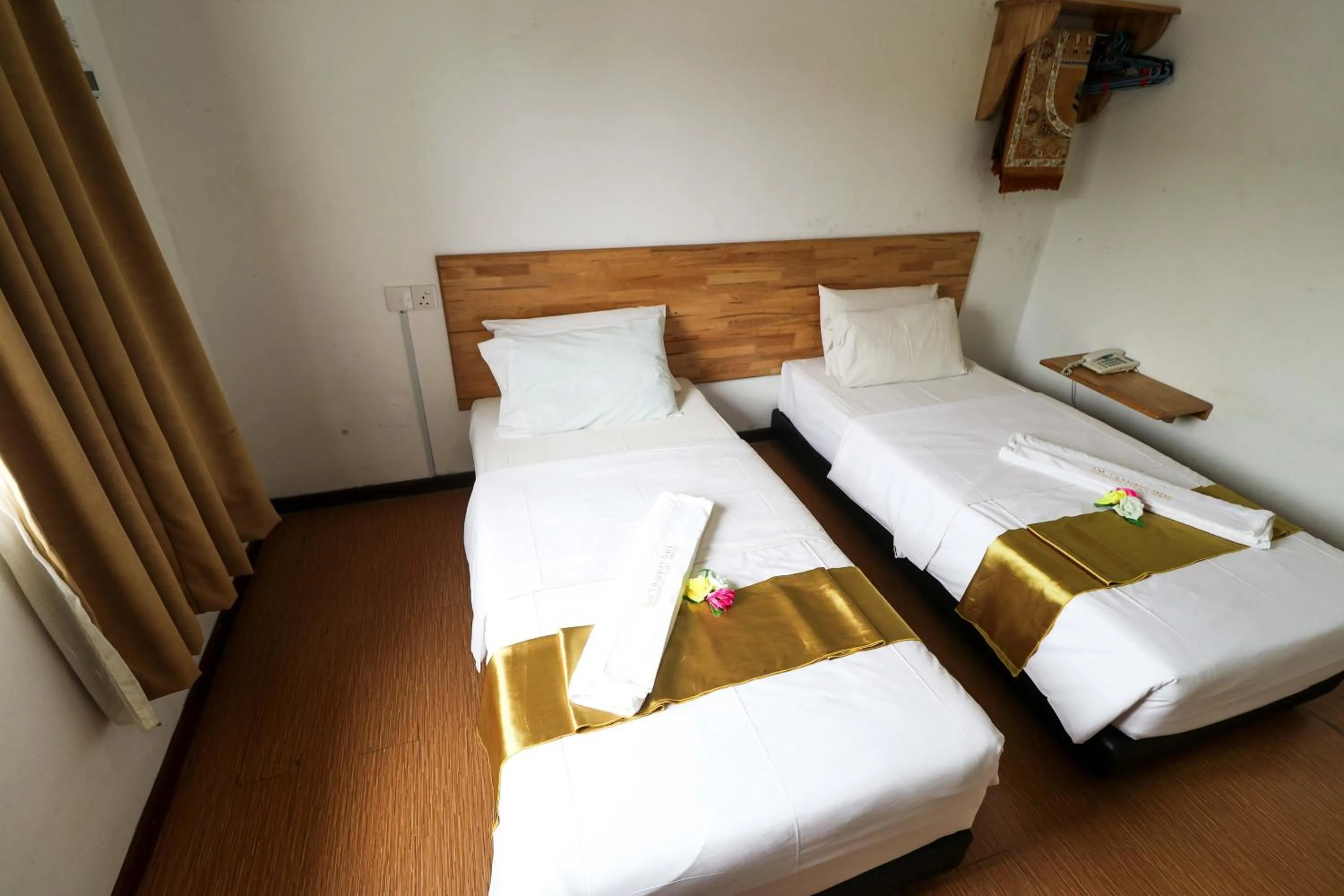 Bed in AM Transit Inn Kuala Terengganu