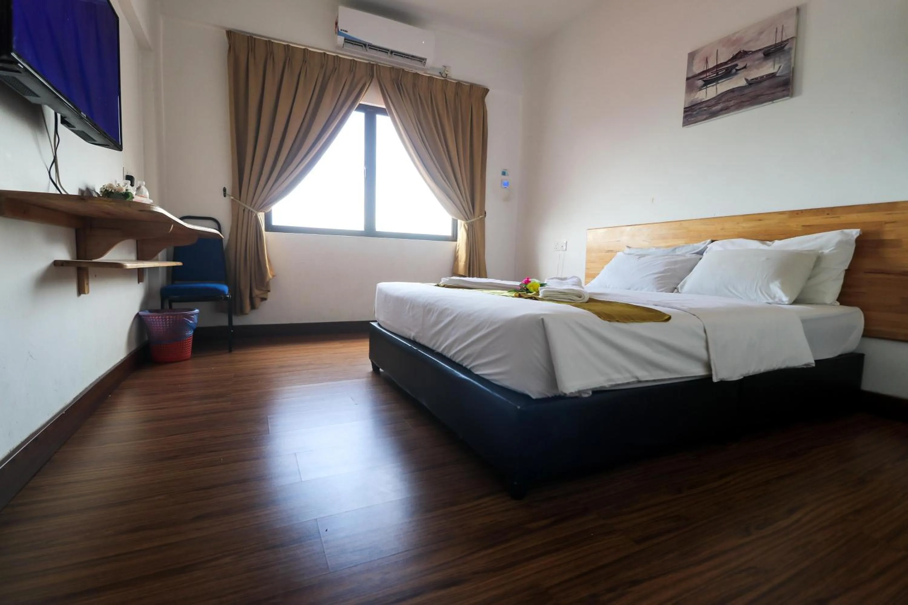 Bed in AM Transit Inn Kuala Terengganu