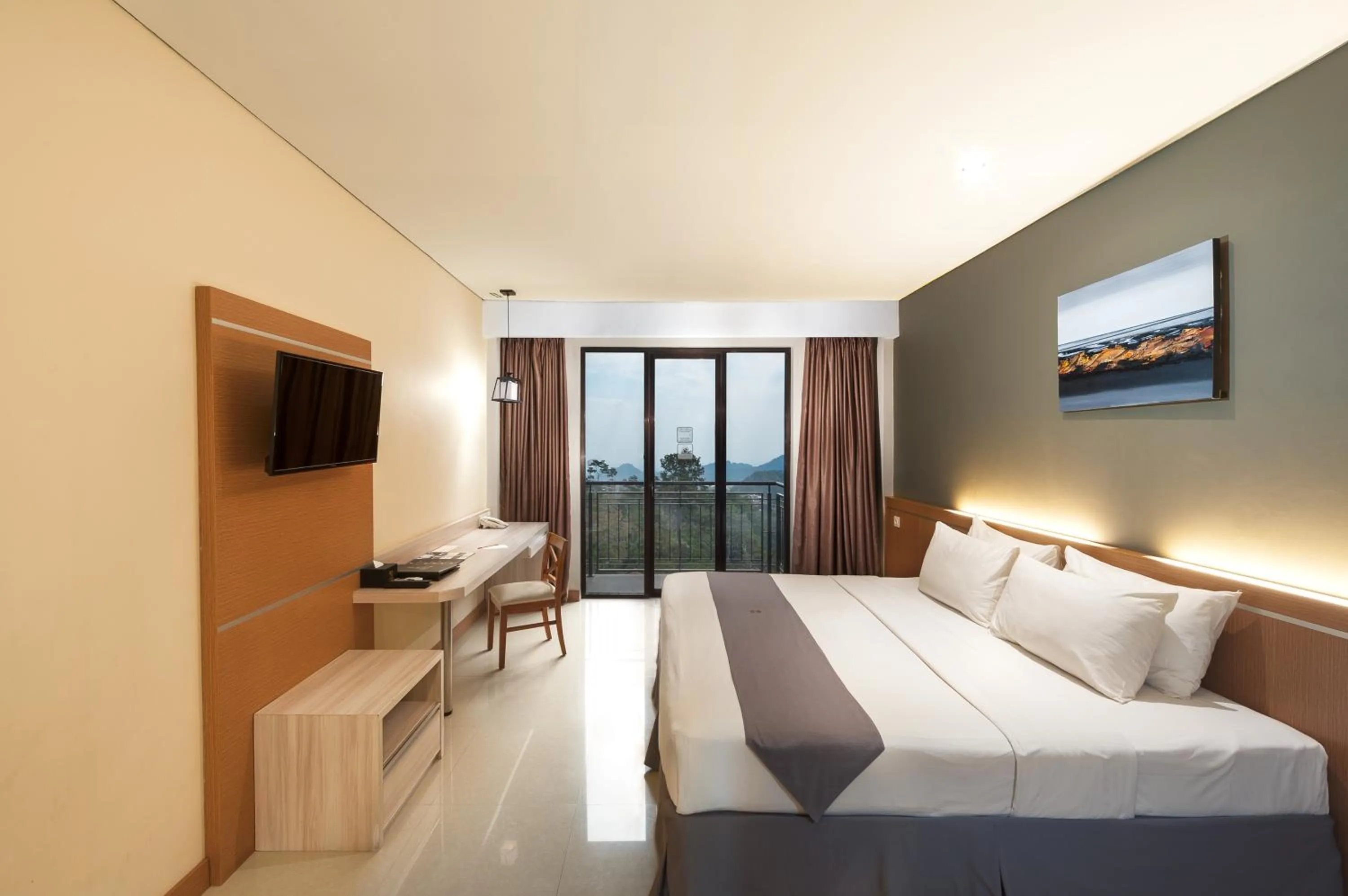 Photo of the whole room, Bed in Nava Hotel Tawangmangu