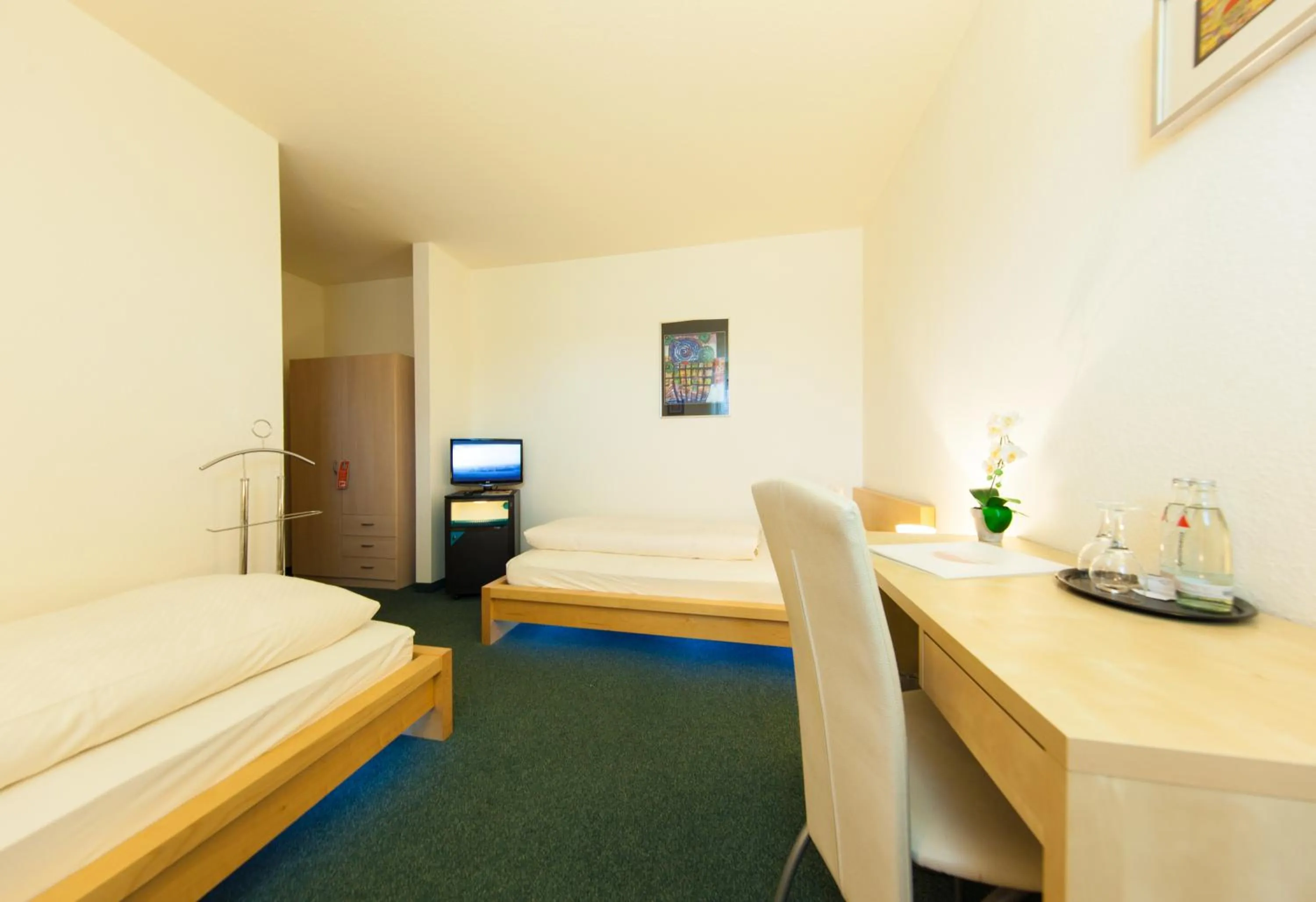 Photo of the whole room, Bed in Garni-Hotel An der Weide