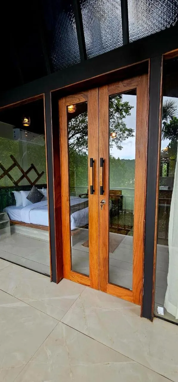 Bed in Vythiri Holiday Resort, Wayanad