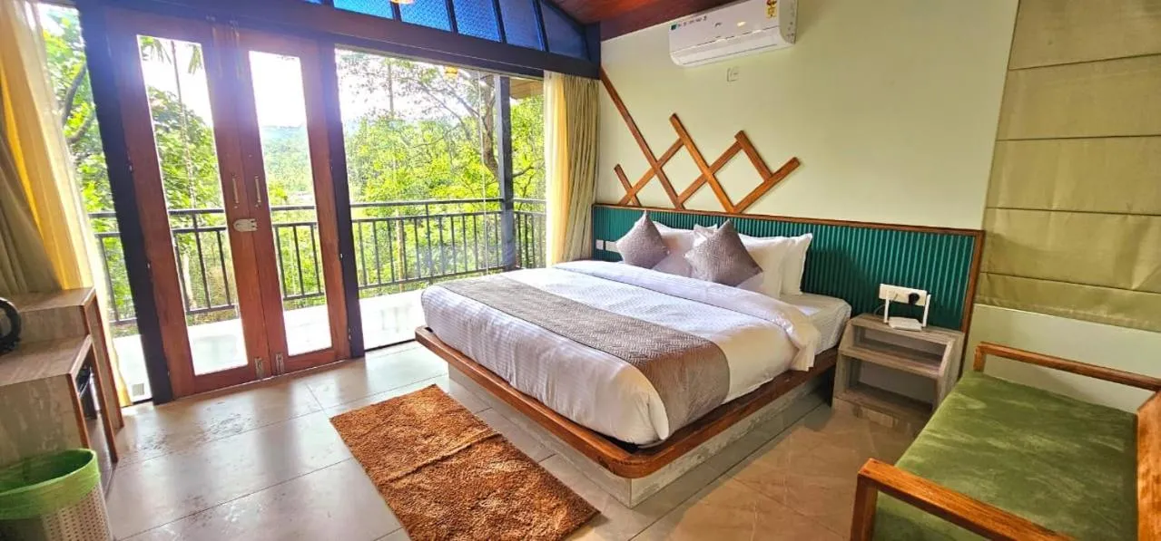 Bed in Vythiri Holiday Resort, Wayanad