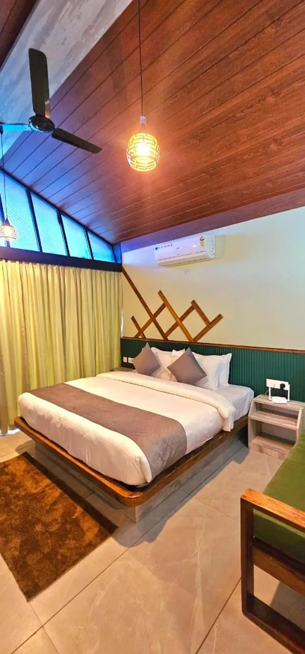 Bed in Vythiri Holiday Resort, Wayanad