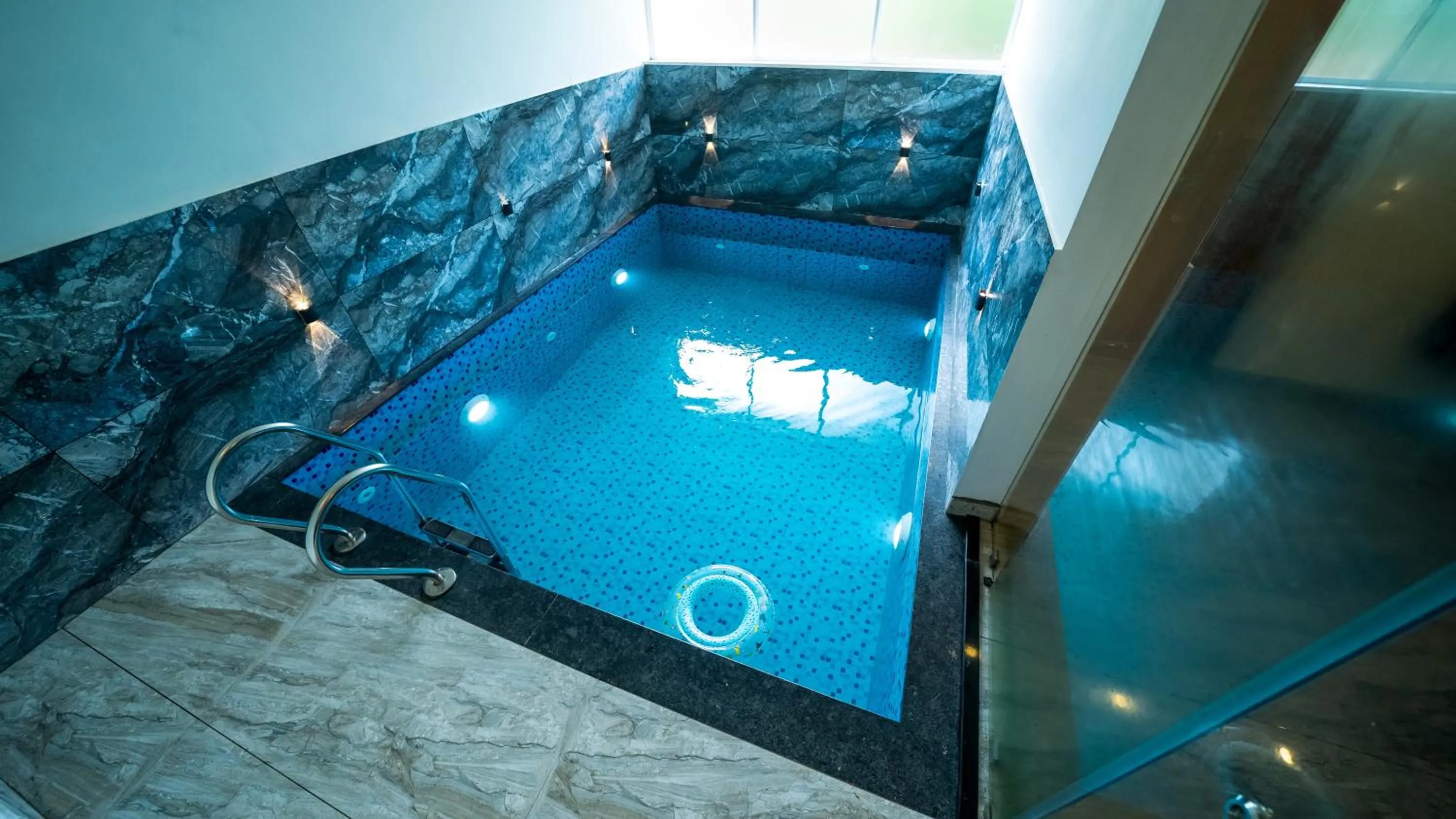 Swimming pool in Vythiri Holiday Resort, Wayanad