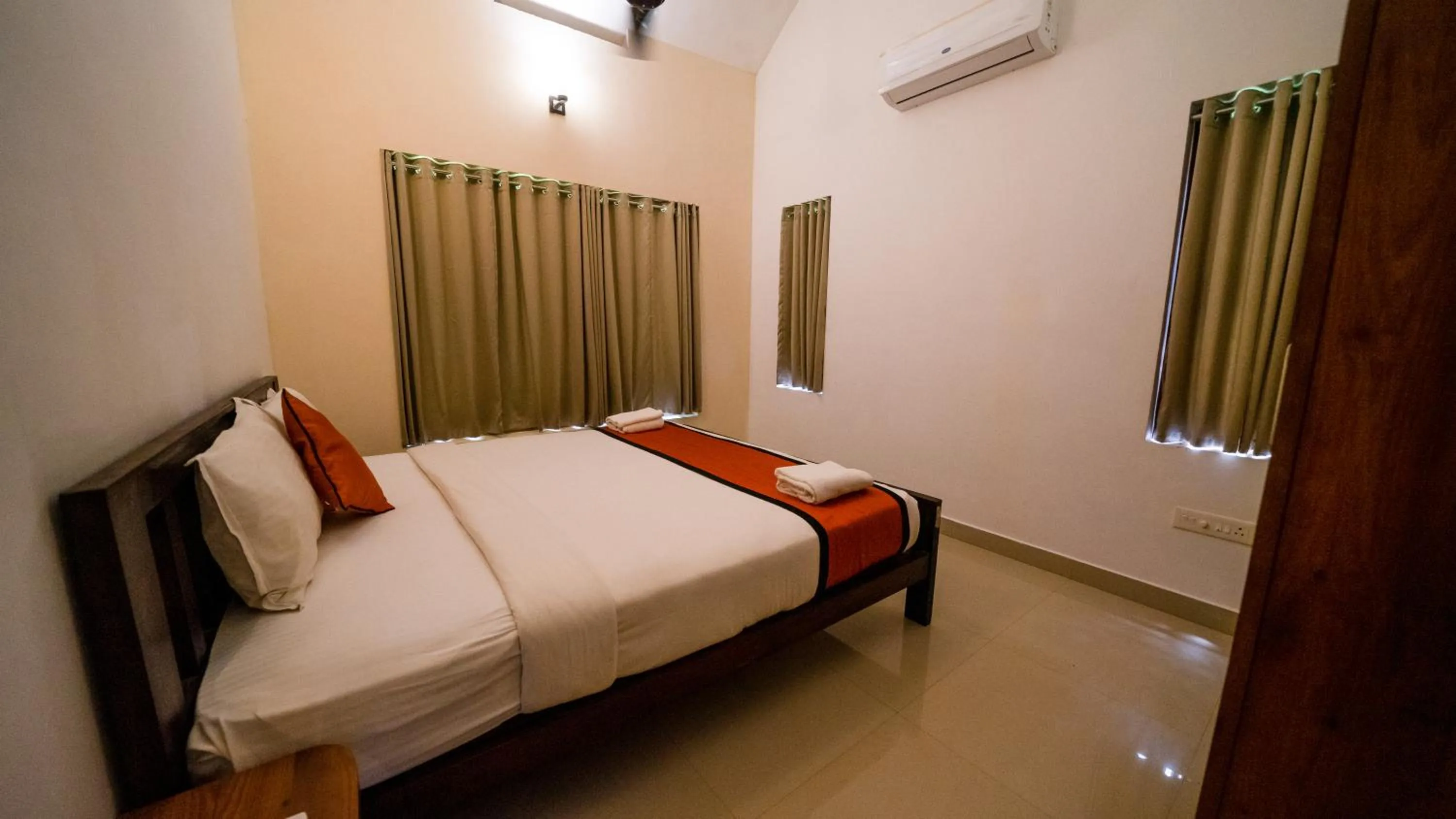 Bed in Vythiri Holiday Resort, Wayanad