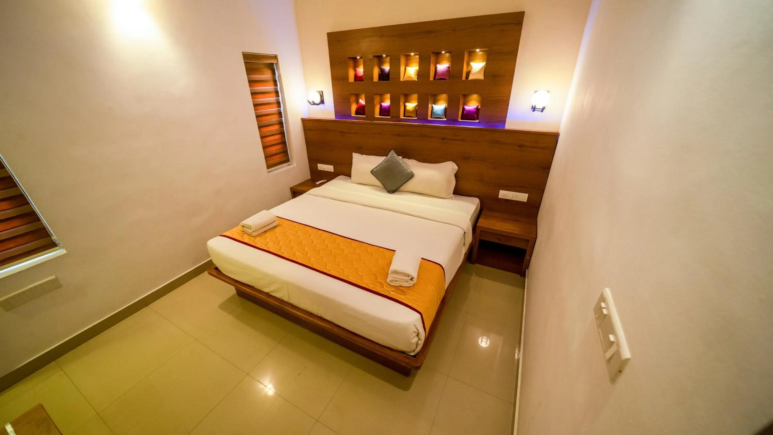 Bed in Vythiri Holiday Resort, Wayanad