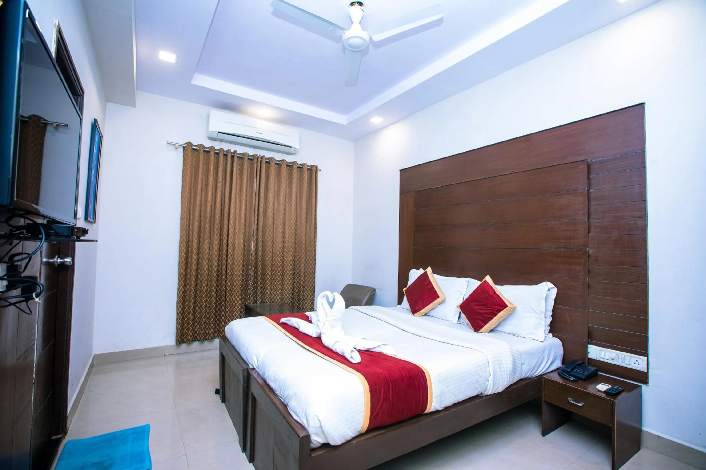 Photo of the whole room, Bed in Orion Residency Hotel Near Chennai Central Railway Station