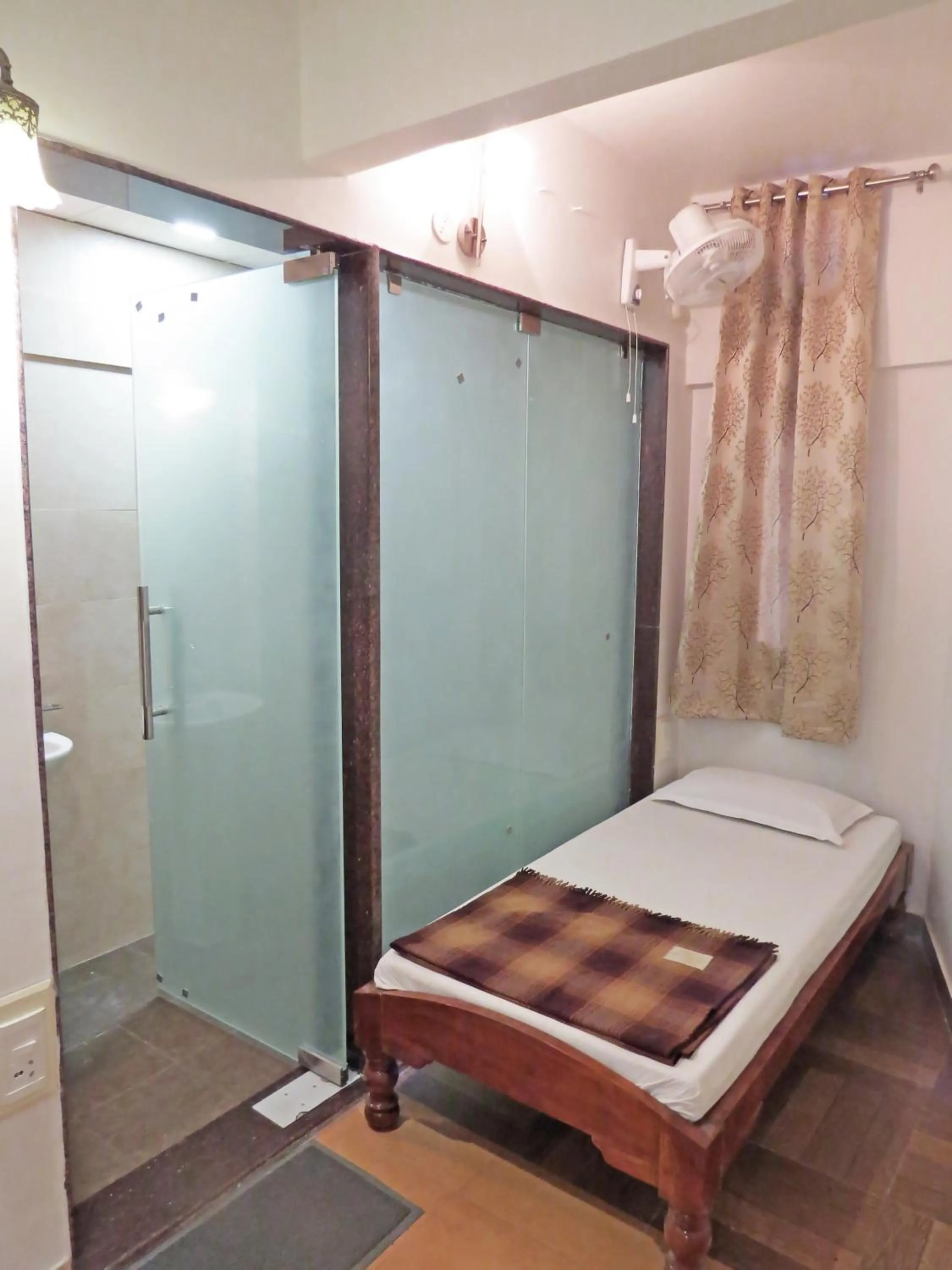 Bed in Hotel Rangoli