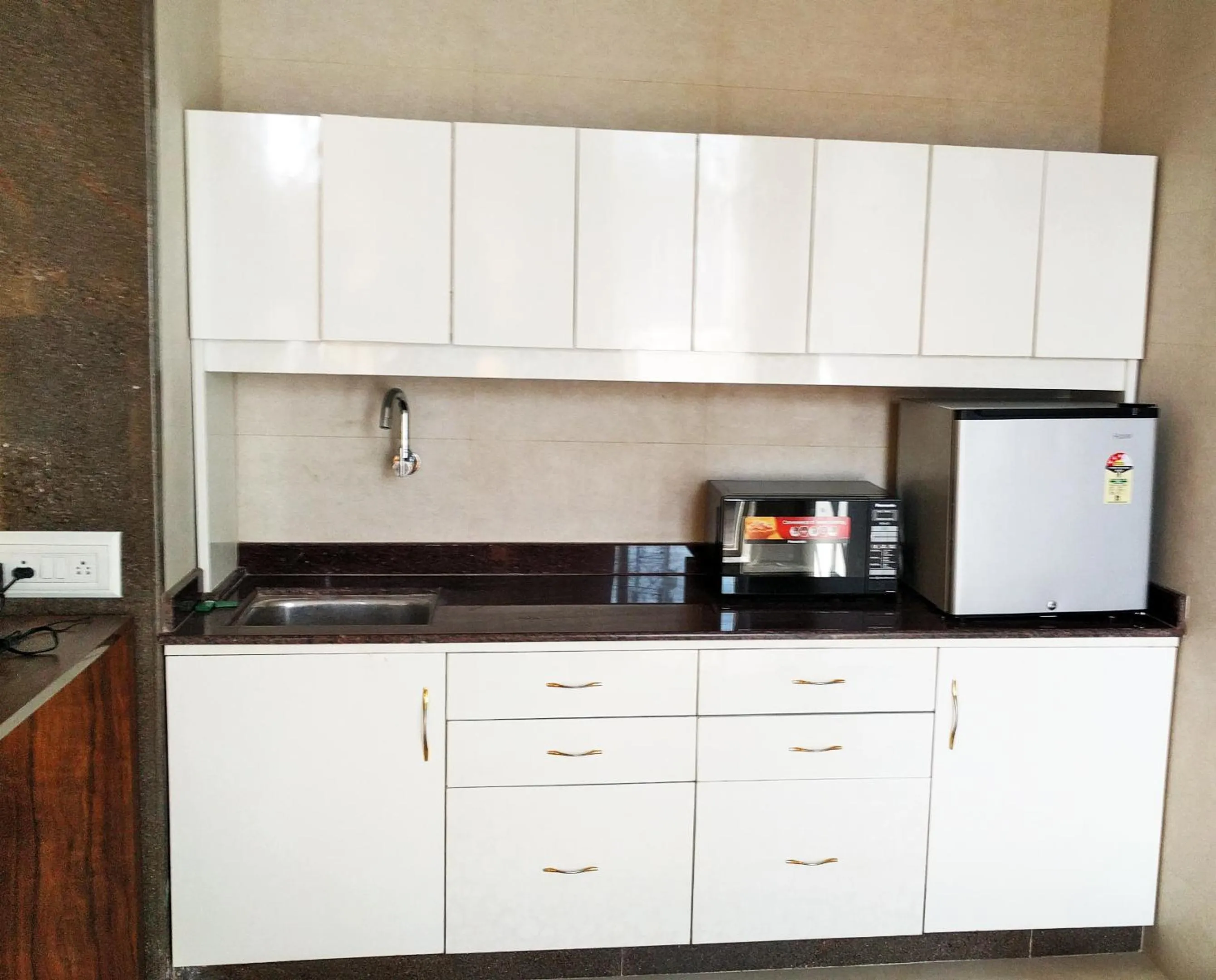 Kitchen or kitchenette in Hotel Rangoli