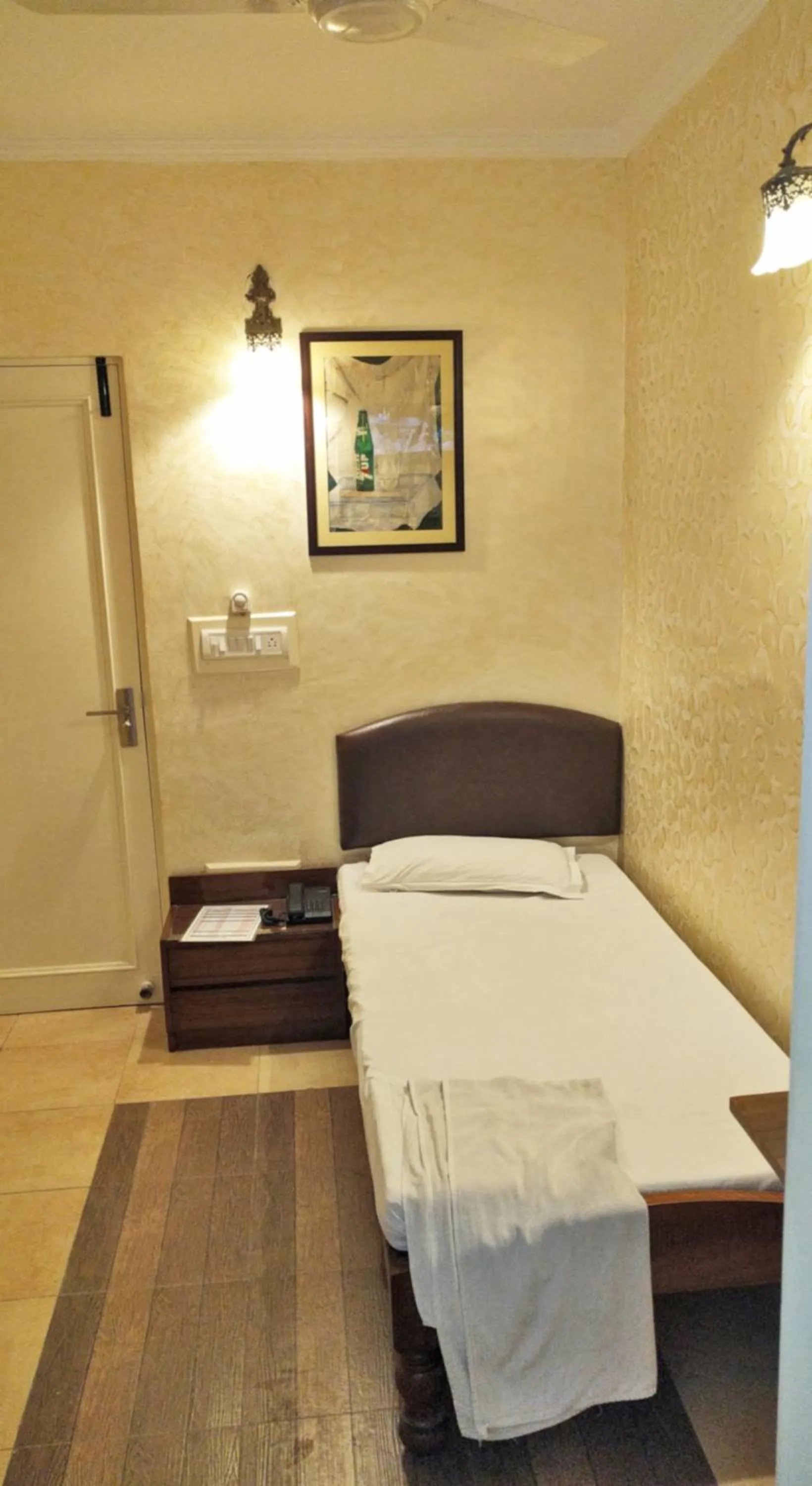 Bed in Hotel Rangoli