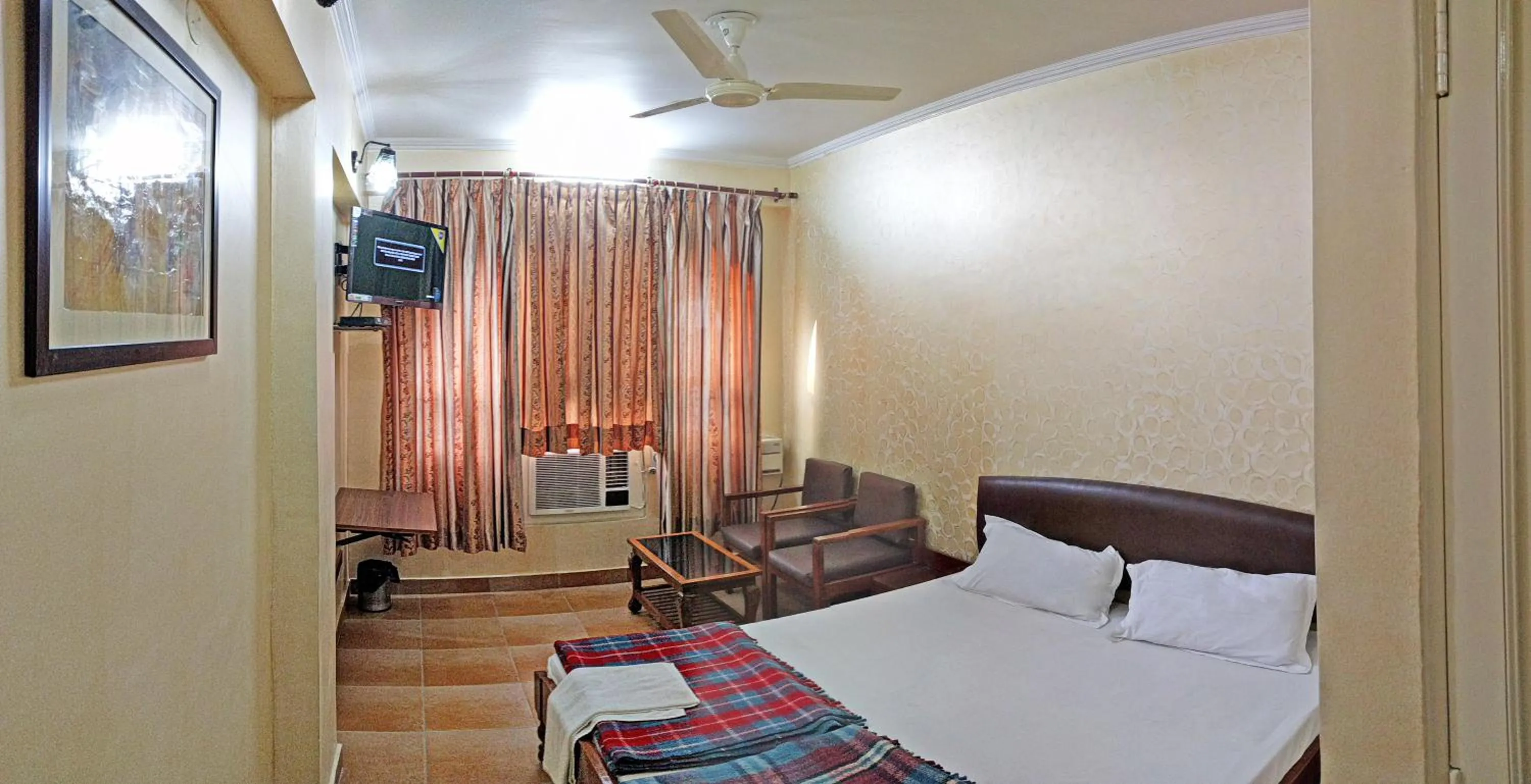 Bed in Hotel Rangoli