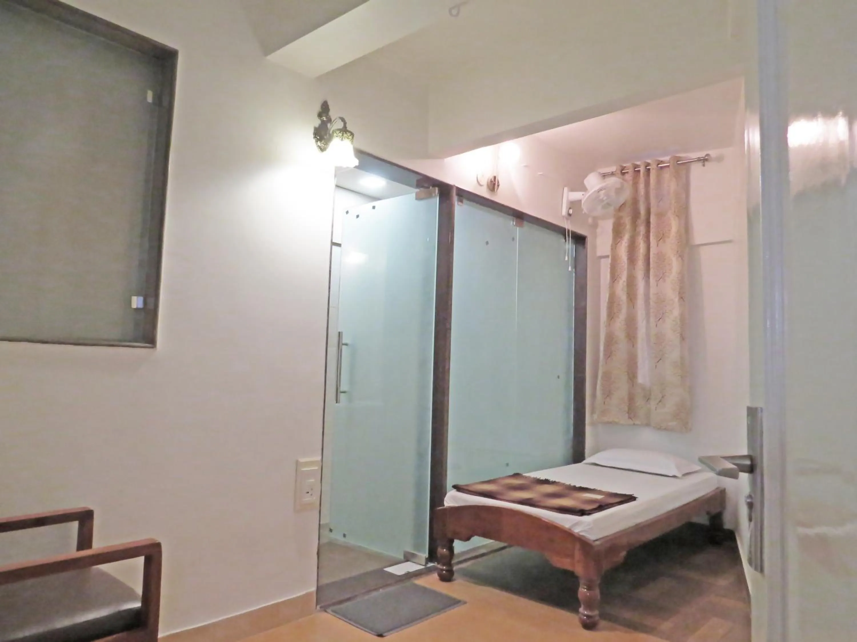 Bed in Hotel Rangoli