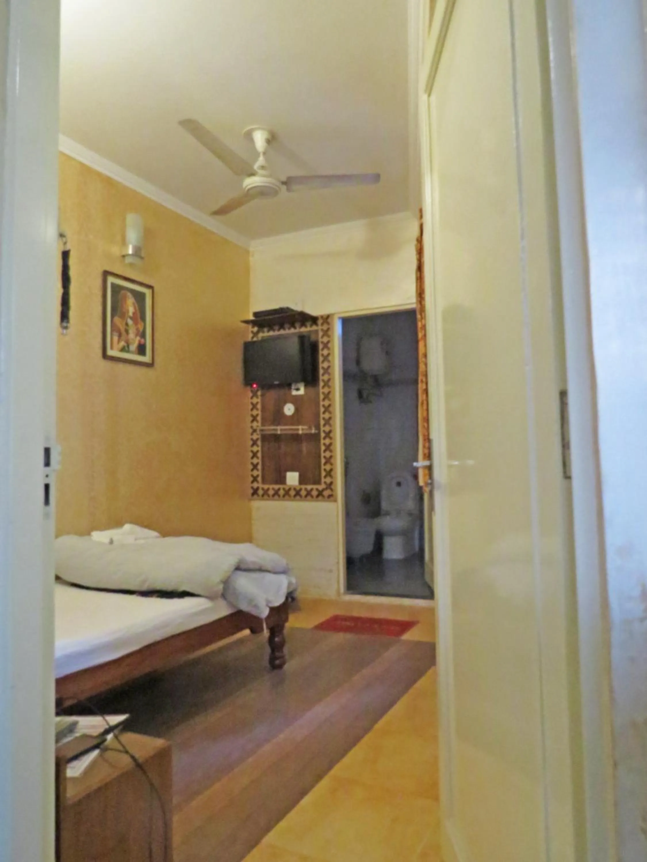 Bed in Hotel Rangoli